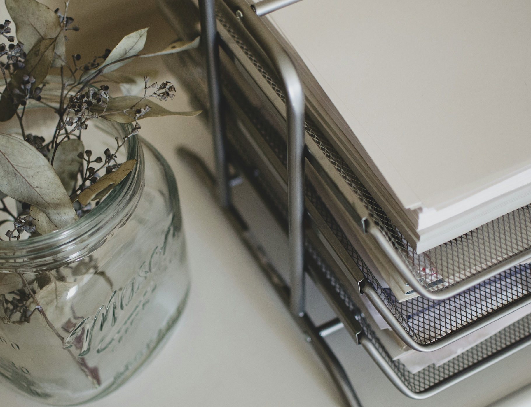 Image of file organizer and decorative flowers.