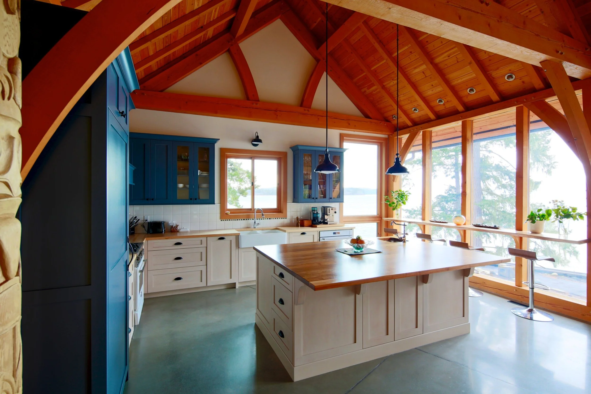 Reef_House_Kitchen_02_through_timber_arch.jpg
