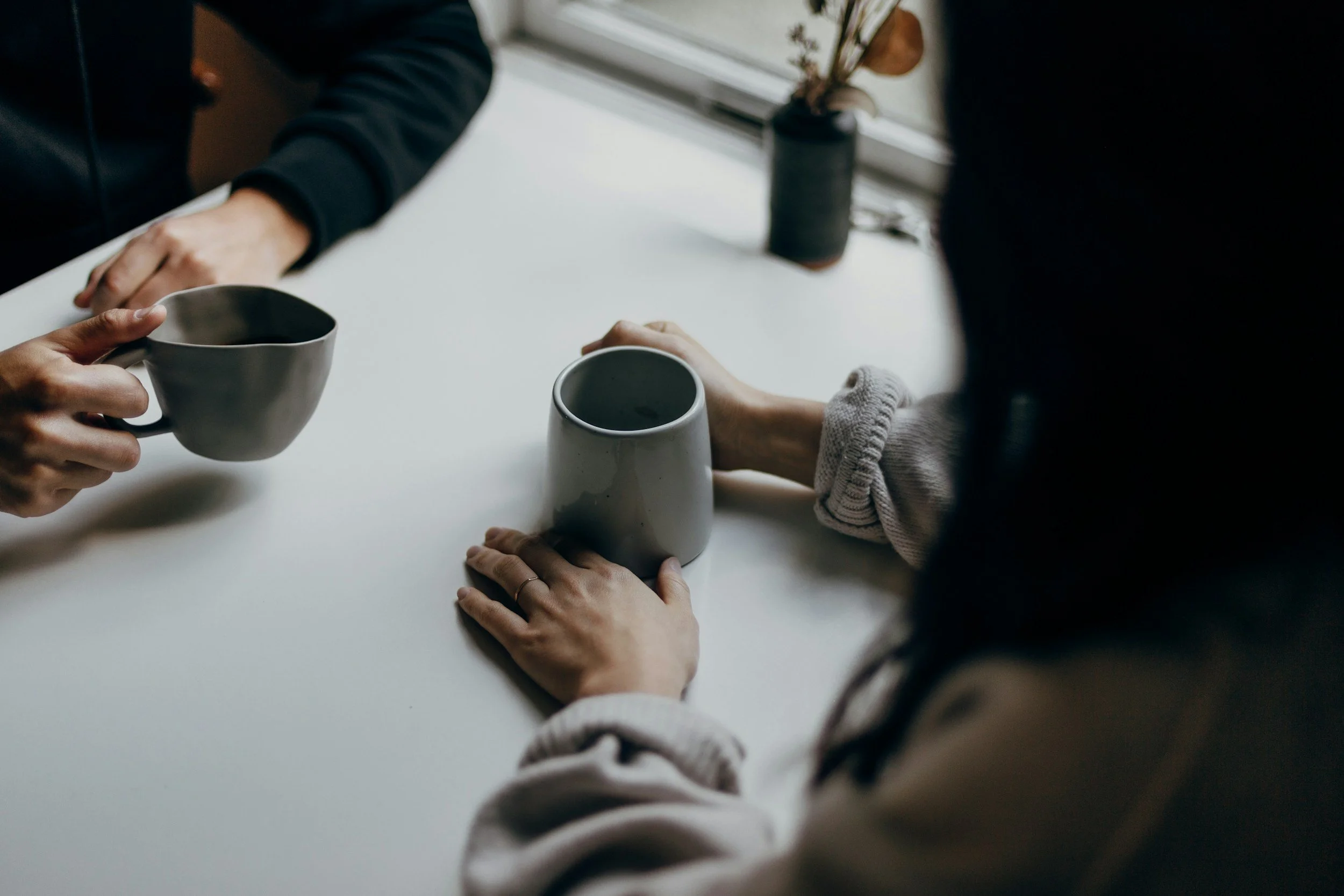 Image of two women drinking coffee, representing a therapy session with Tara Quick, Christian OCD therapist in Murfreesboro TN and online therapy in GA and TN.