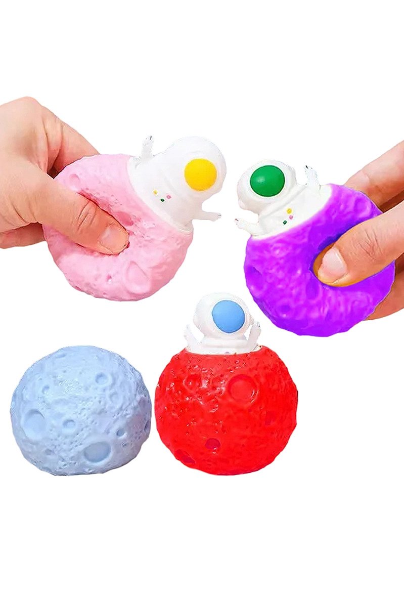 Colorful squishy UFO toy with pop-out alien character