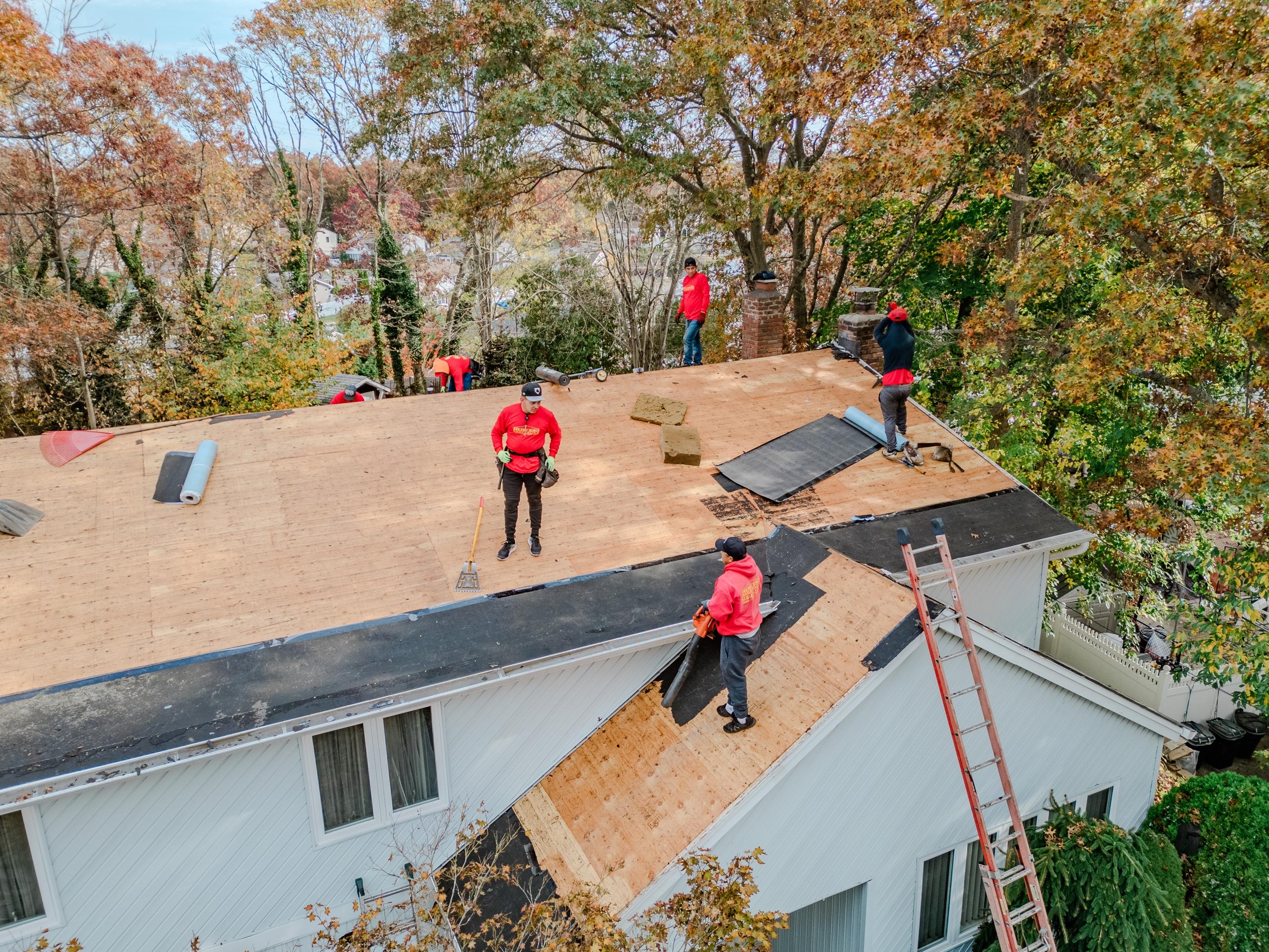 Responsible Remodeling Finishing Wood Panels On Roof