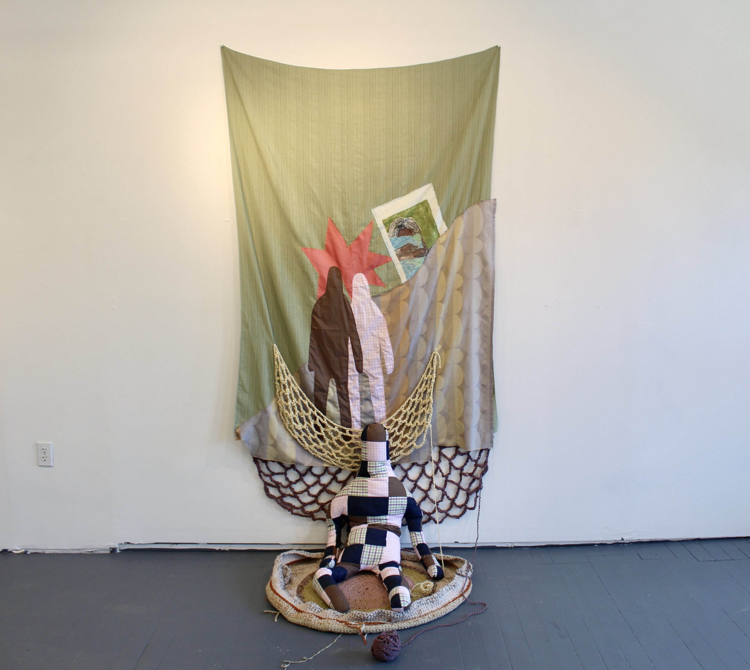 "Never The Child", found fabric, crochet, embroidery, polyfil, rice, monotype, 80" x 36" x 30", 2022