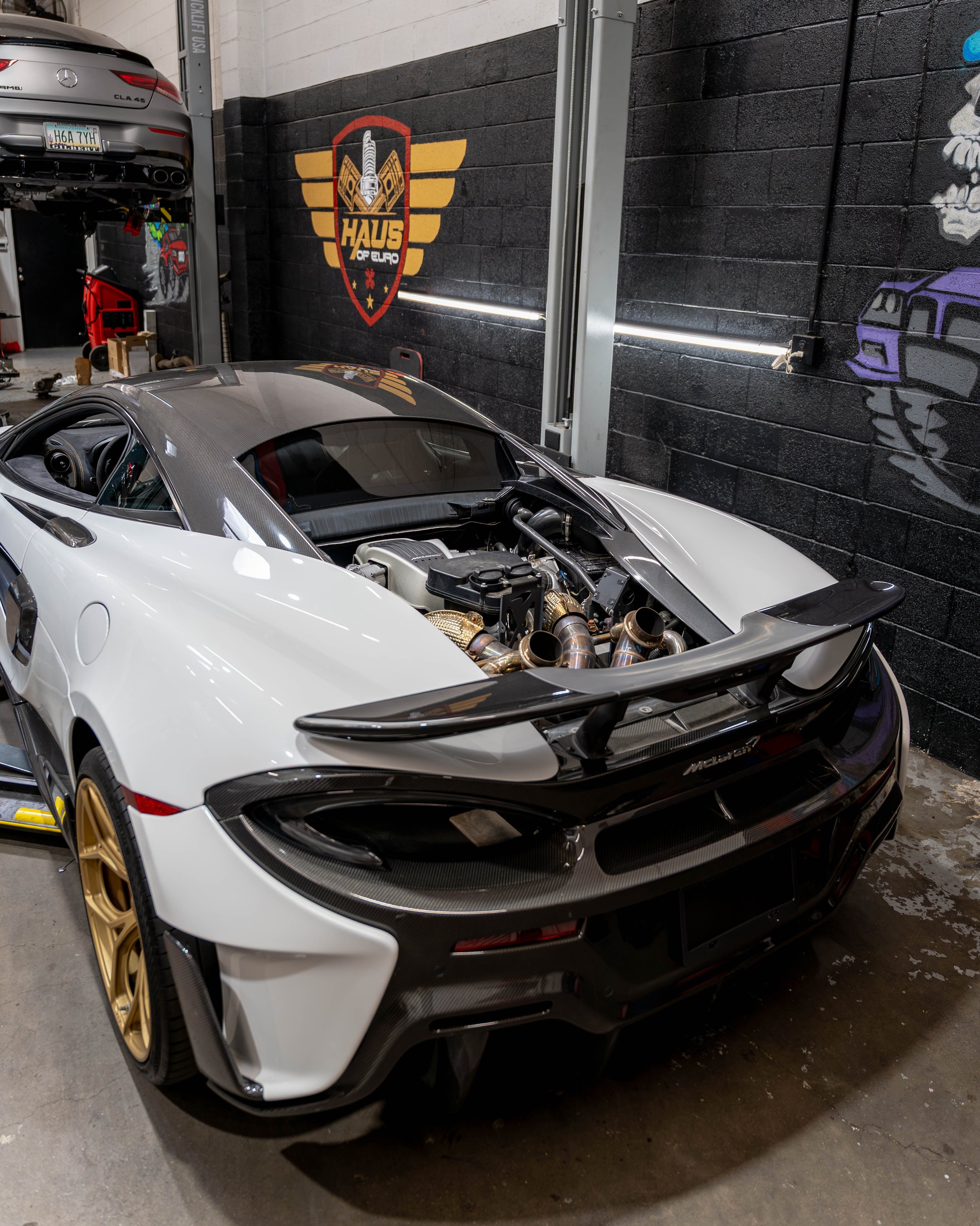 A white McLaren 650 S getting a IE Tune and service at Haus of Euro in Tempe.