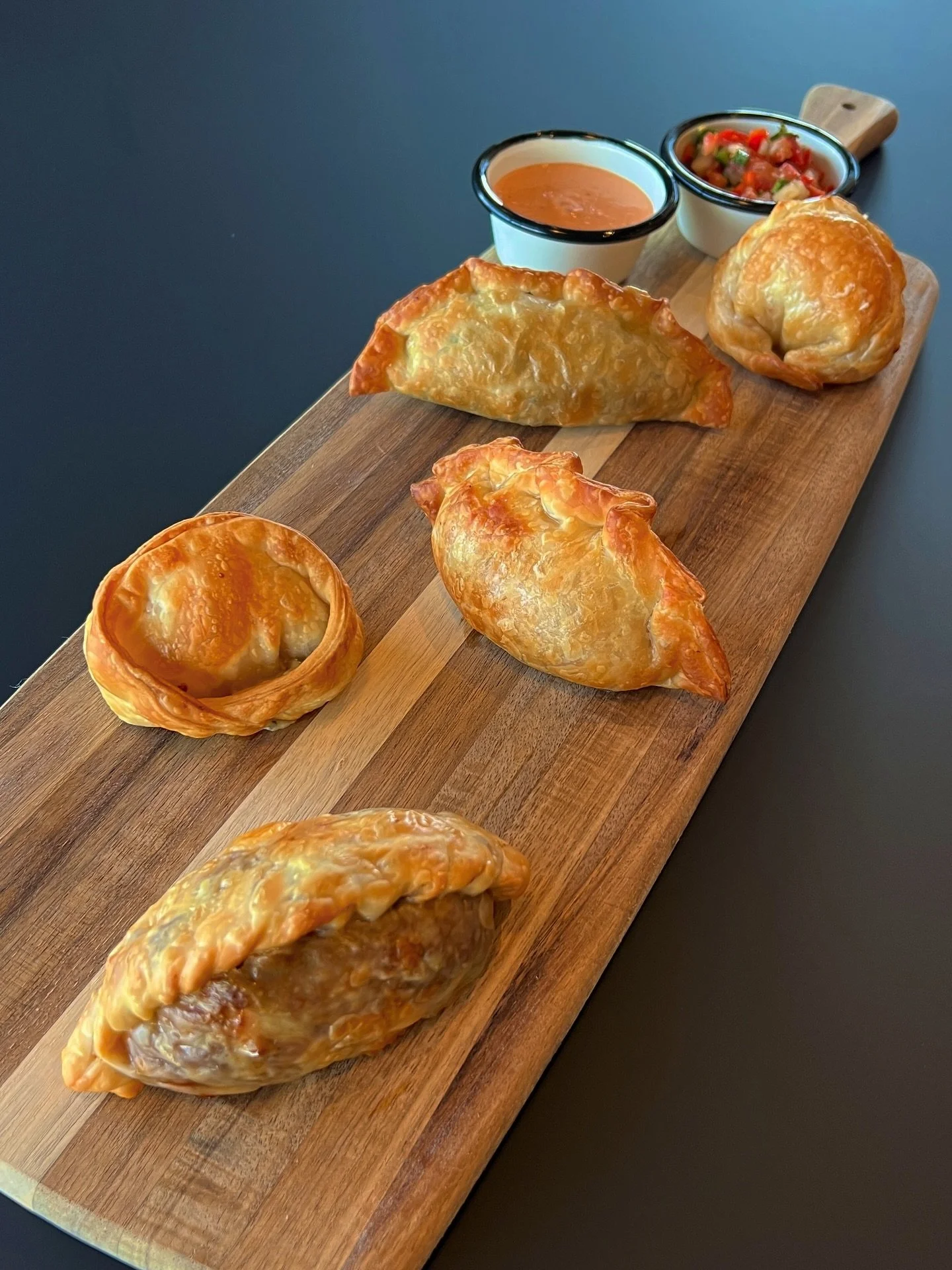 From our kitchen to your hands &mdash; handcrafted empanadas, bursting with flavor. Pop by the pop-up and taste what we&rsquo;ve been cooking up! 🥟❤️