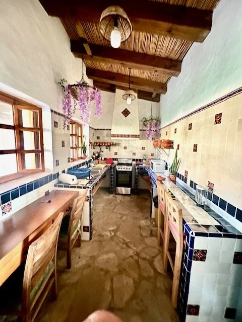 A fully stocked kitchen, complete with all the necessary appliances. To whip up that perfect meal.