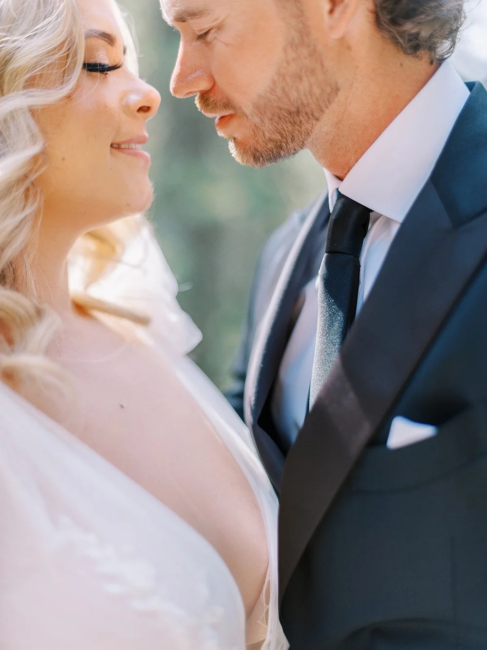 close up cinematic portrait of bride and groom