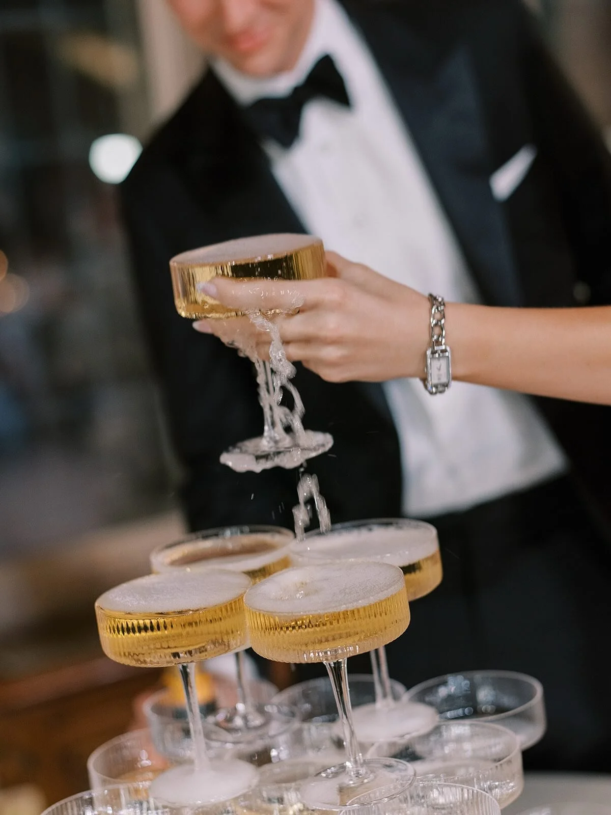 Reception moments. Champagne towers are fun, but my favourite part is when you pick up the glass to cheers and it spills a bit.⁠
.⁠
.⁠
.⁠
⁠Planning &amp; Design: @jodymcbeath @lynnfletcherweddings⁠
Photography: @miltonphoto⁠
Videography: @miltonphoto