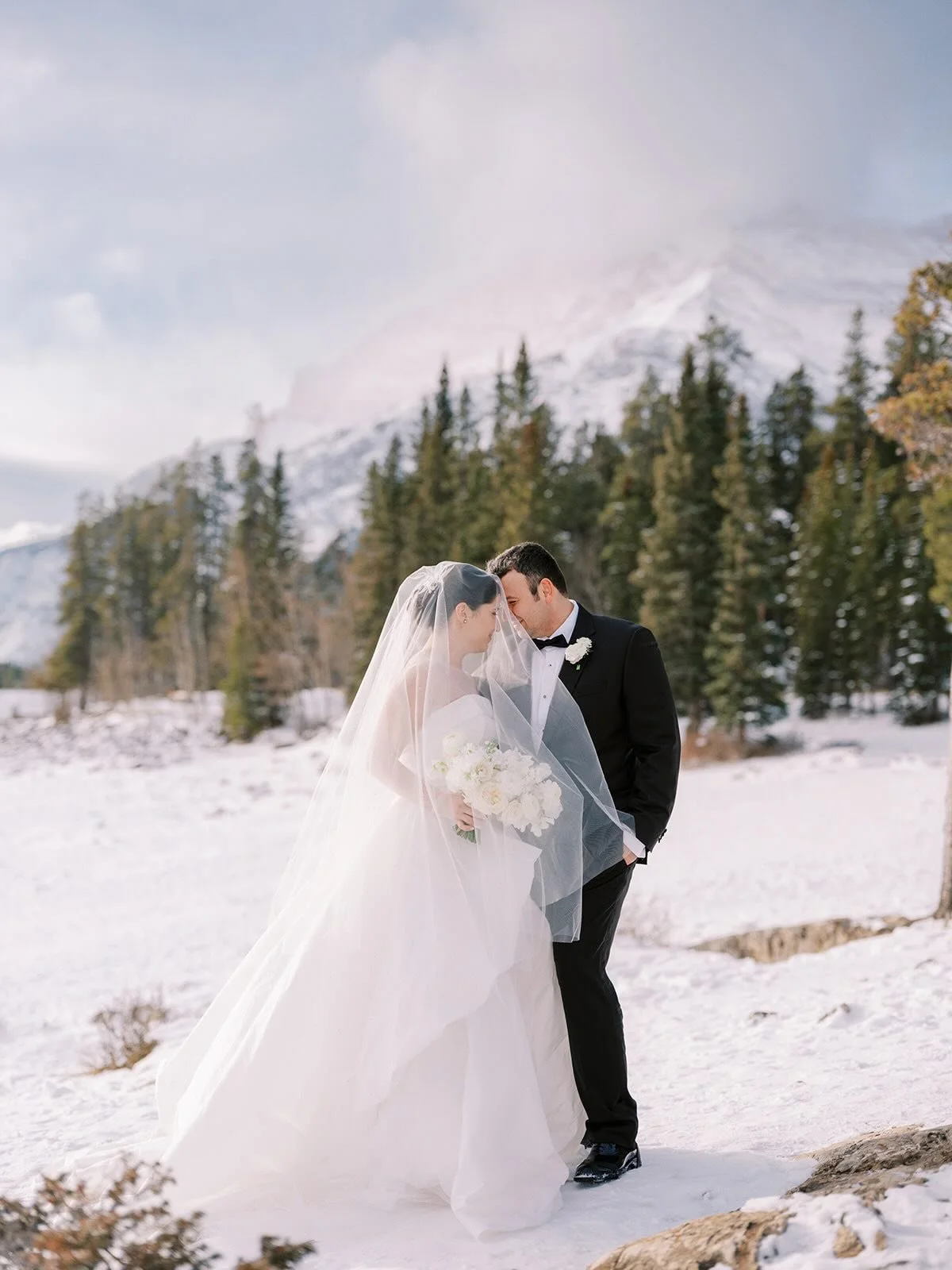 Winter weddings are so cozy and romantic. Some of my favourite weddings of all time have been in winter!⁠
.⁠
.⁠
.⁠
Reception Venue: @fairmontbanff⁠
Wedding Planner: @julianneyoungweddings⁠
Florals: @flowerartistry⁠
Hair &amp; Makeup: @topknotbrides ⁠
