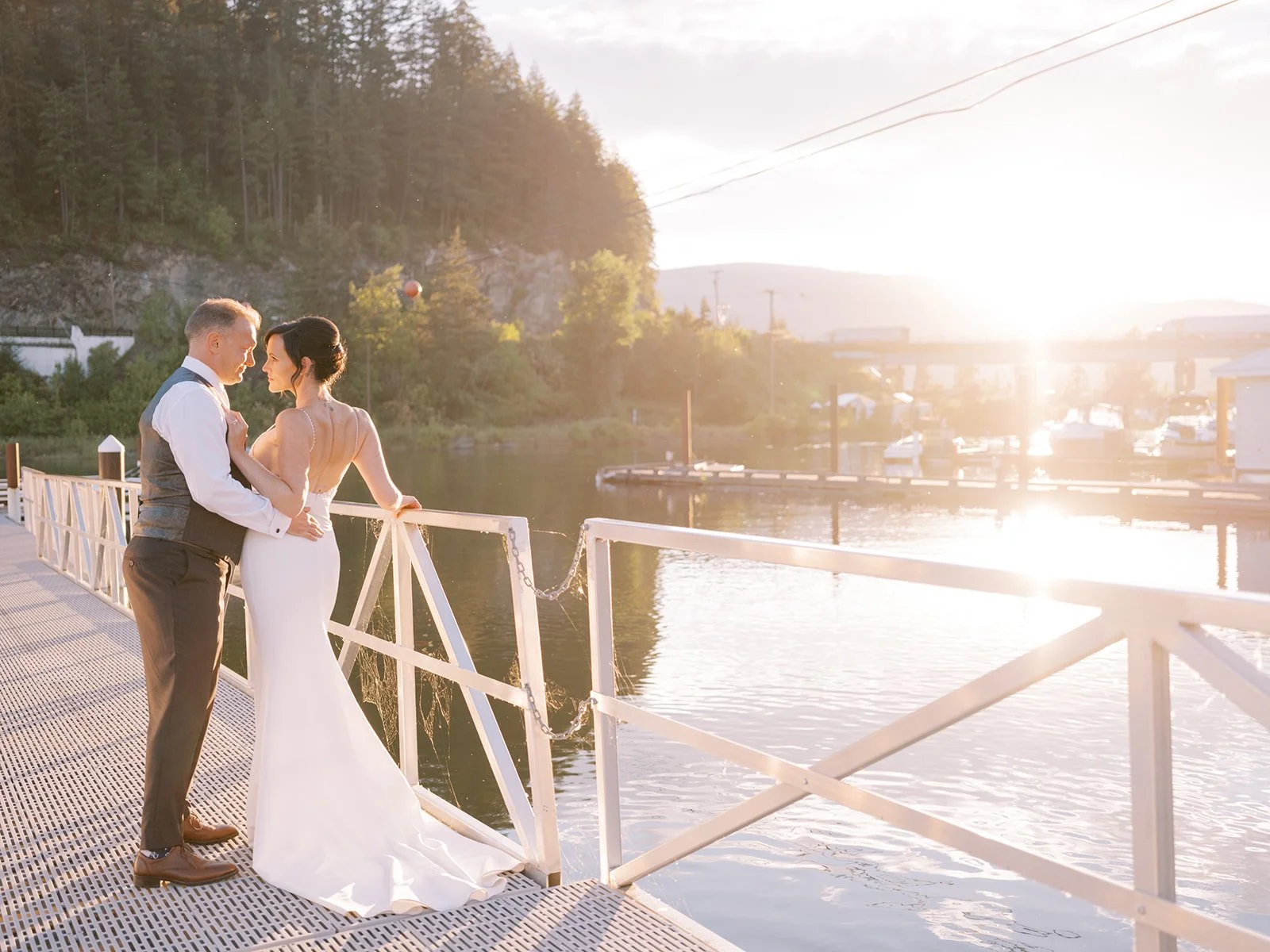 bride and groom at sunset wedding reception in sicamous