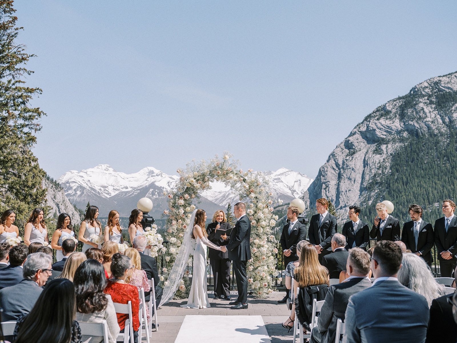 wedding ceremony on the terrace at the banff springs hotel