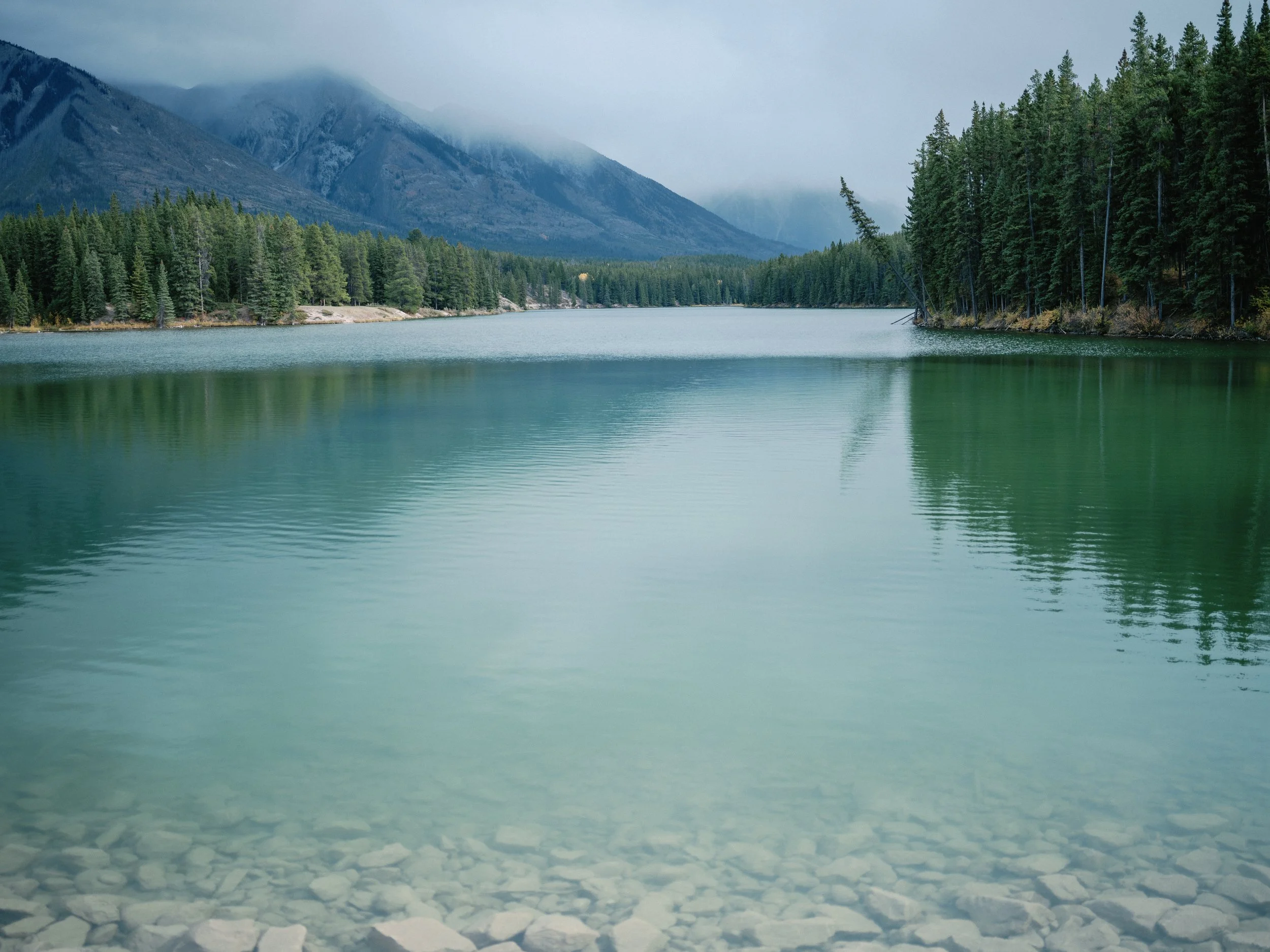 Romantic Rocky Mountain elopement at Lake Louise with sunrise mountains