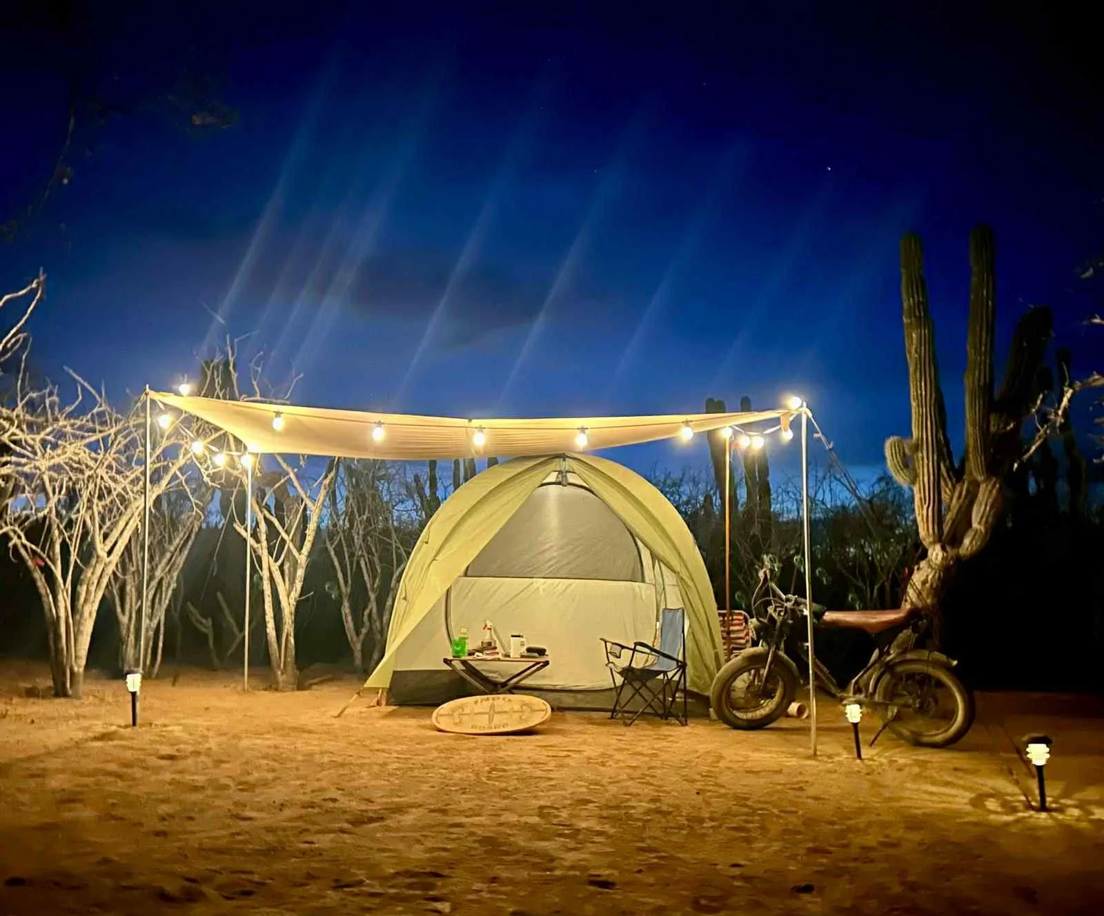 Tent set up at night under a starry sky at Rancho Escondido RV campground in El Pescadero, Baja California Sur.