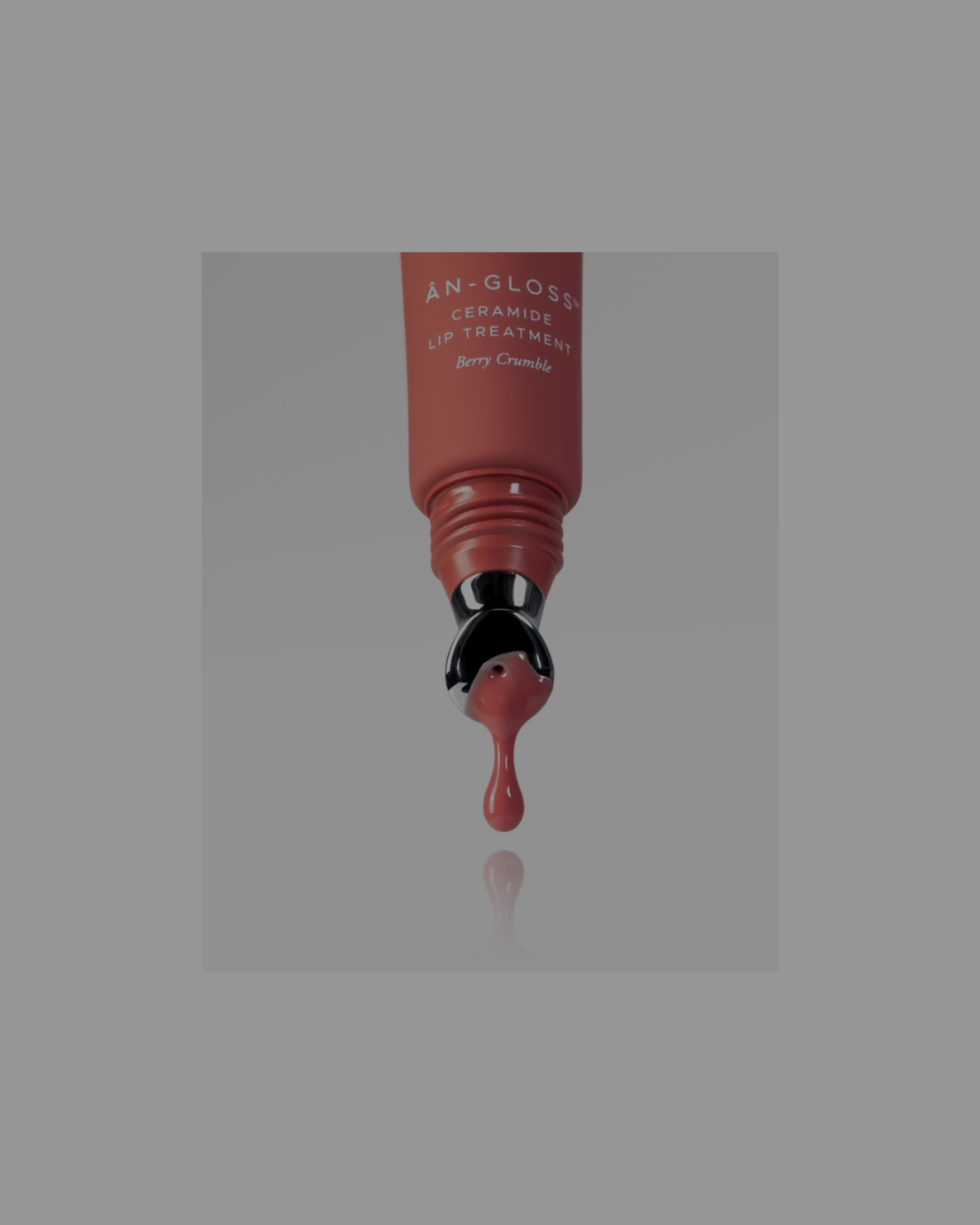 Collection of SkinBetter Science skincare products including moisturizers, serums, and sunscreen, arranged with a mirror in the background.