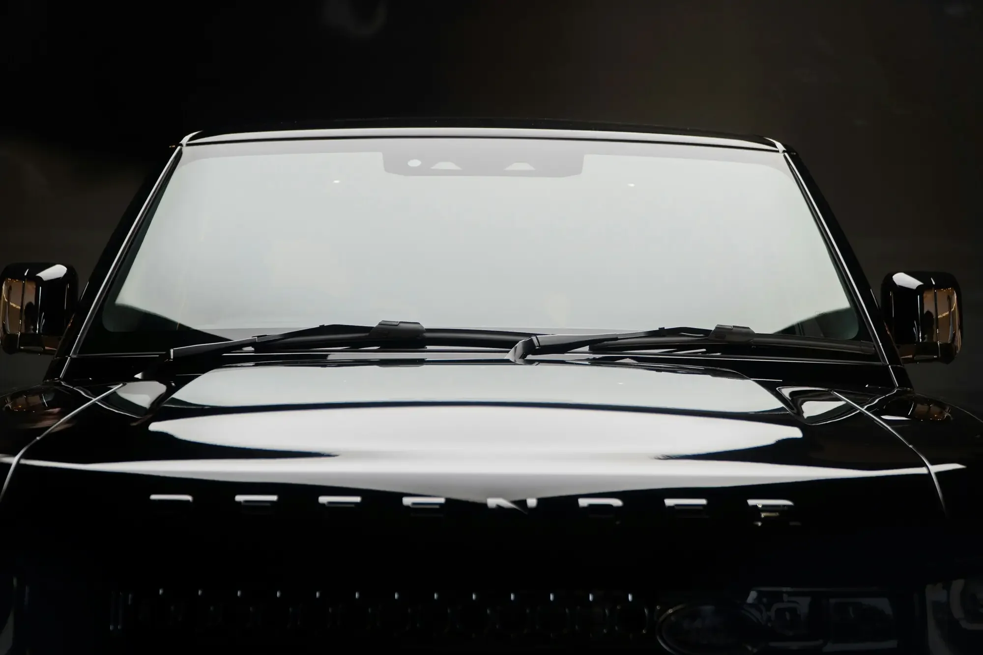 Luxury SUV with a clean windshield representing professional auto glass service
