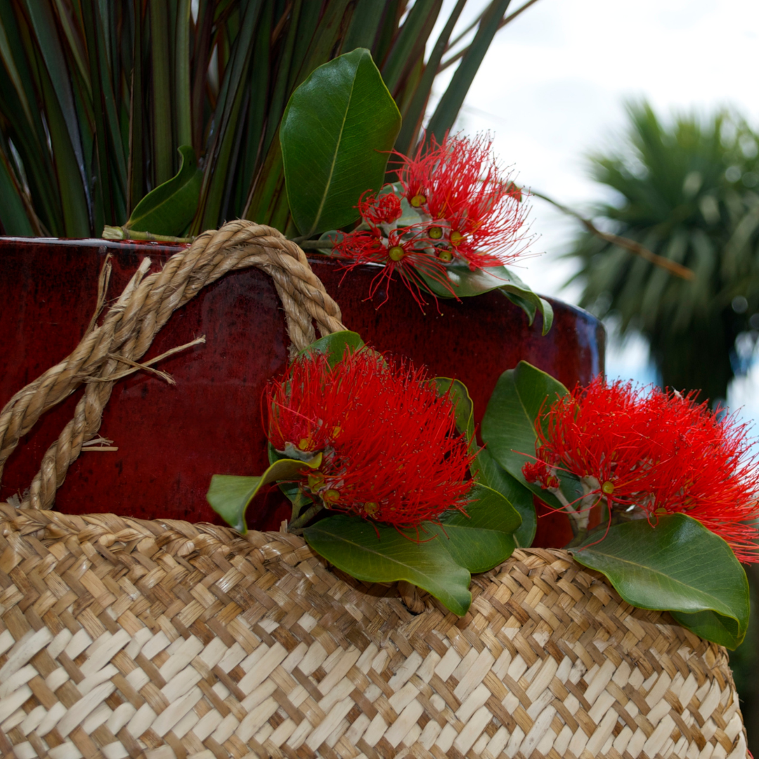 pohutukawa flowers and leaves in a basket