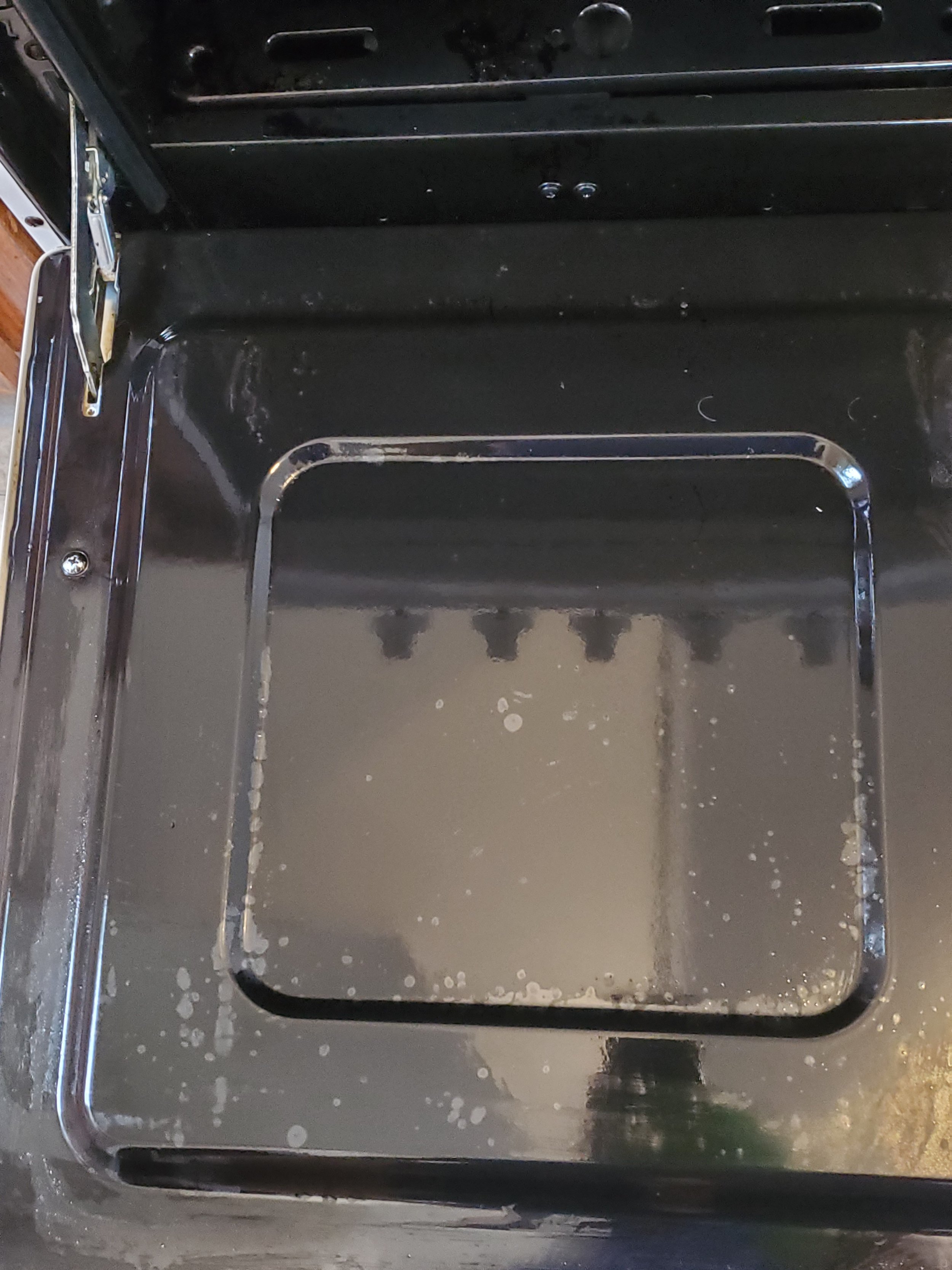 Oven door after burnt food was cleaned - AFTER DEEP CLEANING