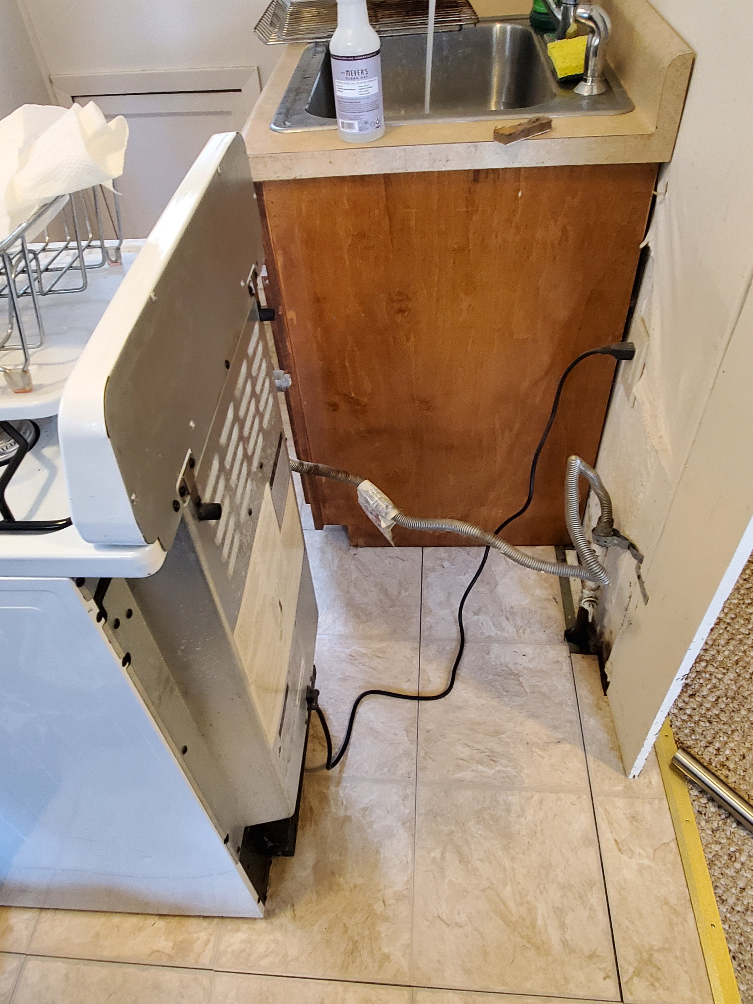 Floor behind stove after debris and dust cleaned - AFTER DEEP CLEANING