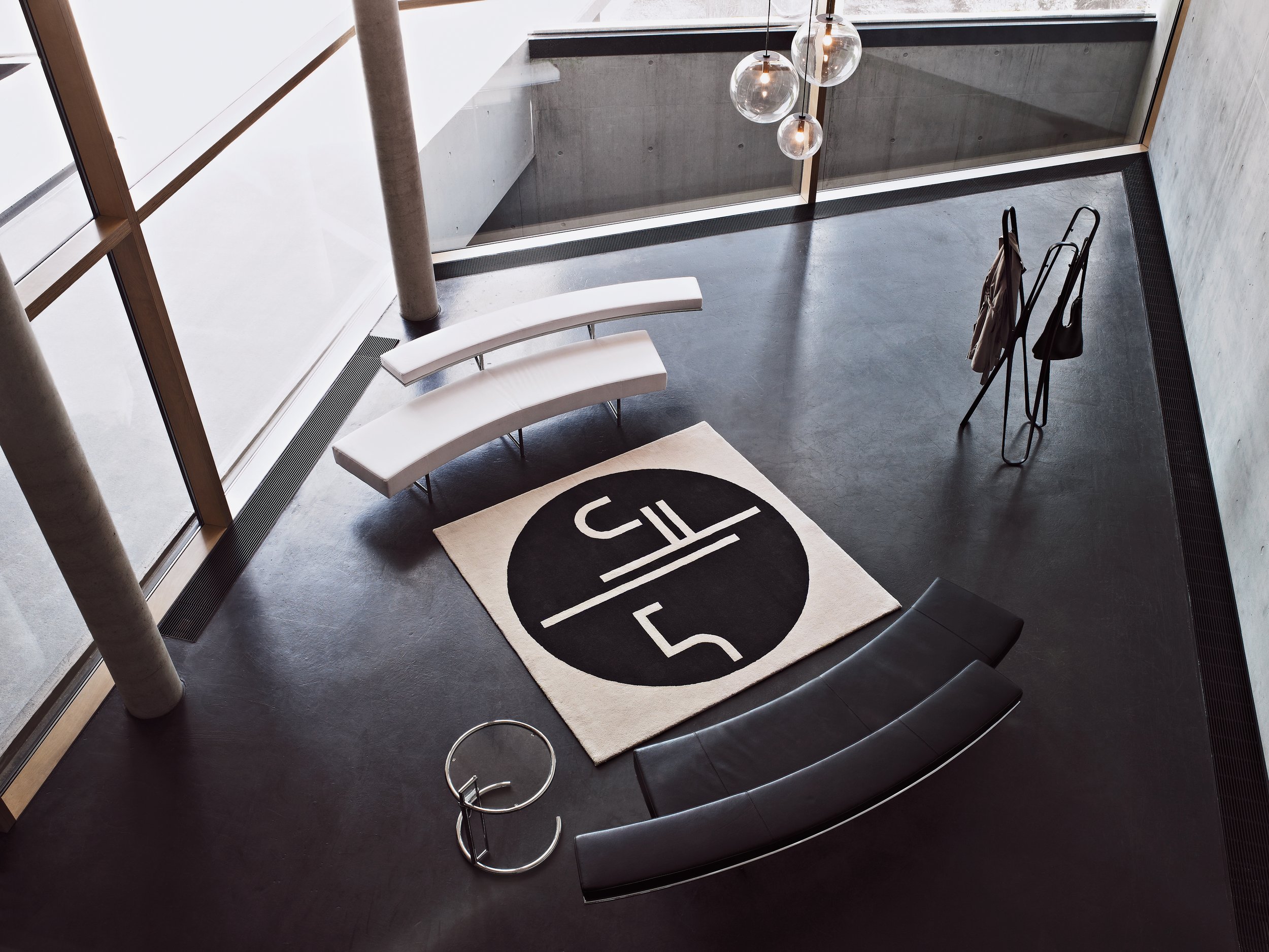ClassiCon-monte-carlo-sofa-st-tropez-rug-adjustable-table-e-1027-selene-pendant-lamp-saturn-coat-stand-photo-seelen.jpeg