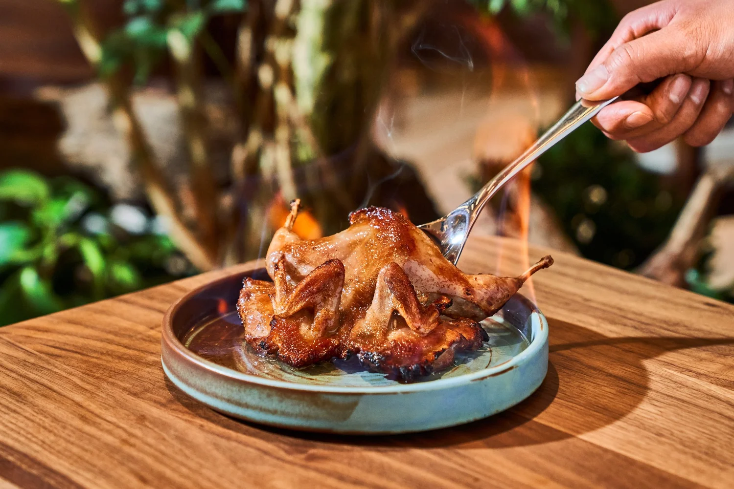 Flambéed quail at Le Soleil Stonestown