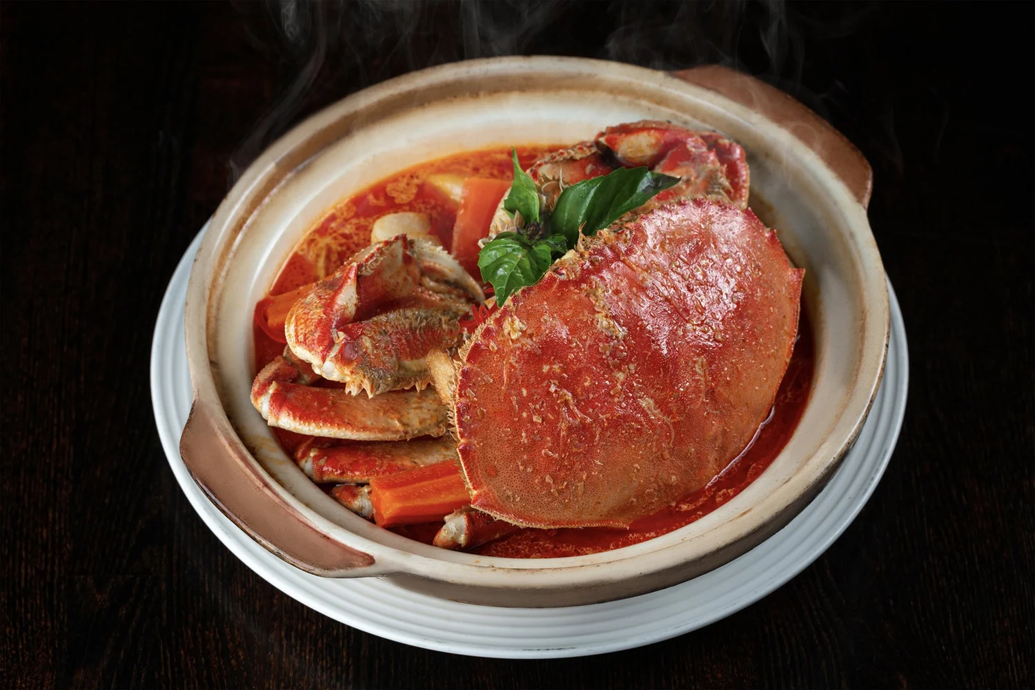 Curried Dungeness crab in coconut curry at Le Soleil