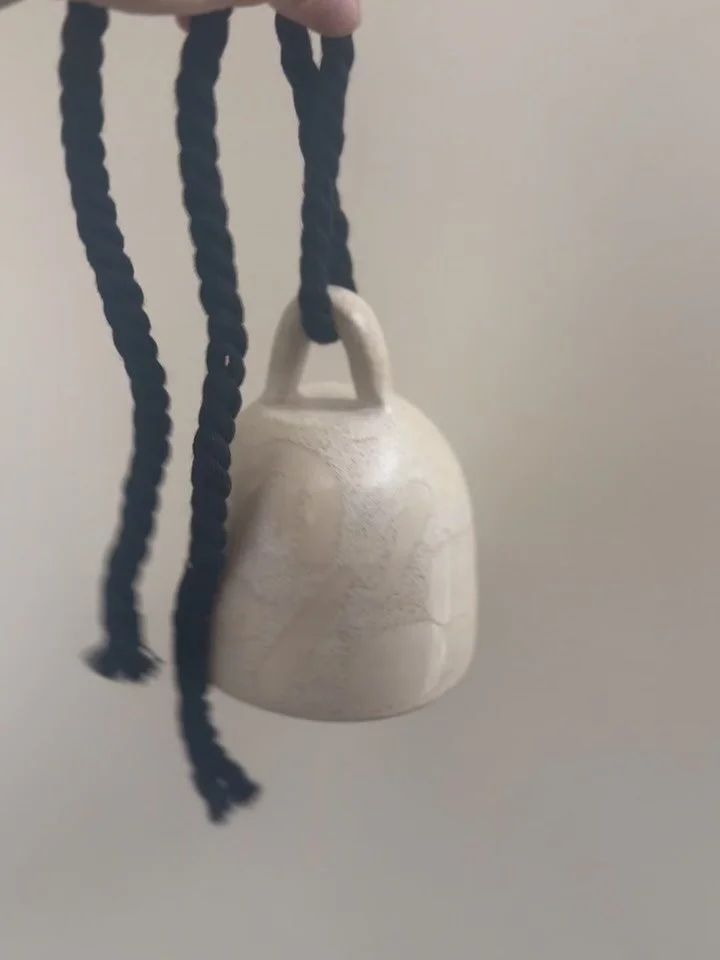 SOUND ON -> I made a f*ing bell! She&rsquo;s gorgeous. Rose gold spek matte white and clear glaze. Subtle design&hellip;. Beautiful thick cotton black rope. I&rsquo;m so happy with this stunner. 🥹🔔🪄
.
.
.
#pottery #potter #ceramics #ceramicarts