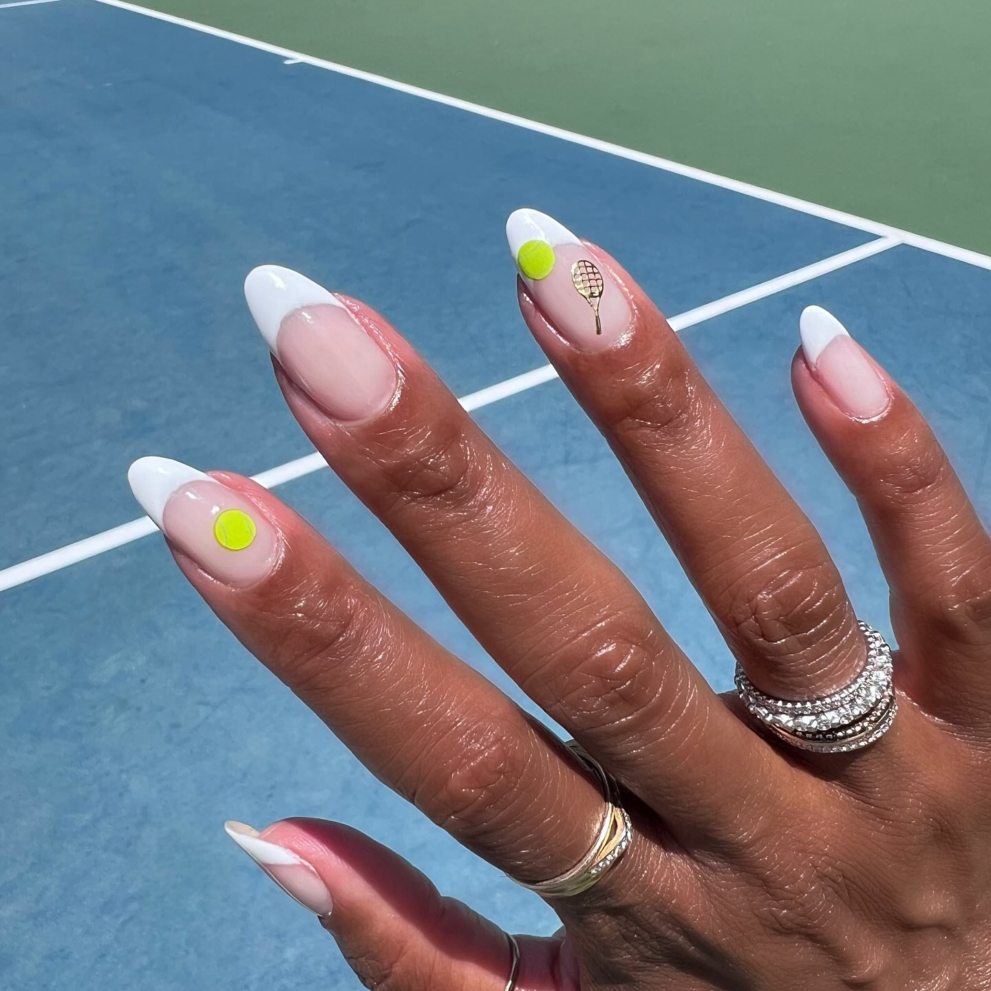 The TMC Tennis event was an absolute hit! Thanks to all who joined both in person and virtually! 

Guests were asked to come wearing their best tennis themed mani, and they all delivered big time! The nails were on point! 

Here&rsquo;s my mani which