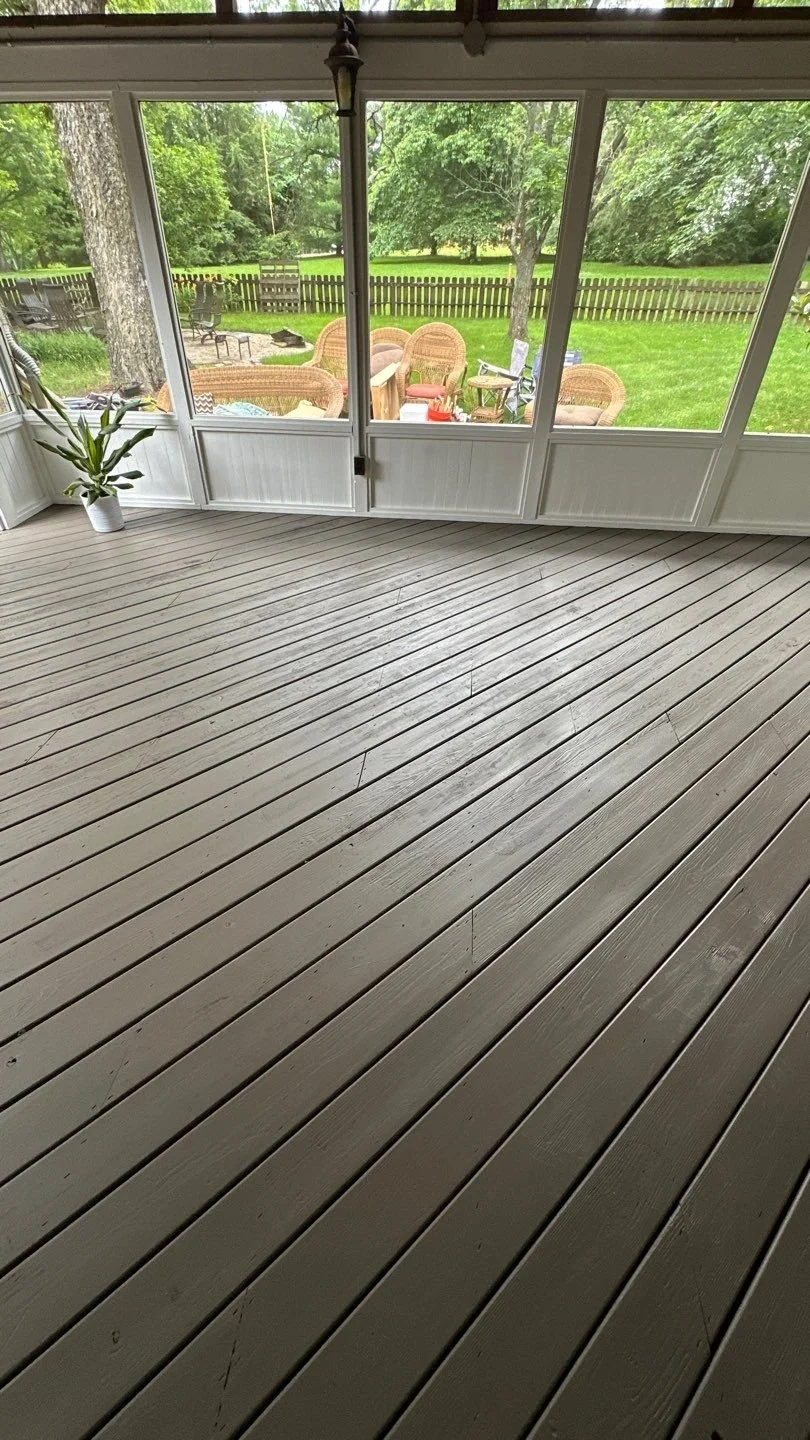 A backyard deck in Brentwood, TN with screened walls and windows