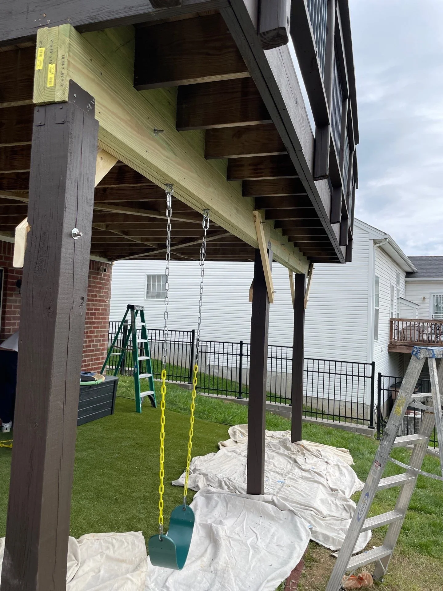 Newly replaced and installed deck supports prior to staining in Nashville, TN by Modern Handymen