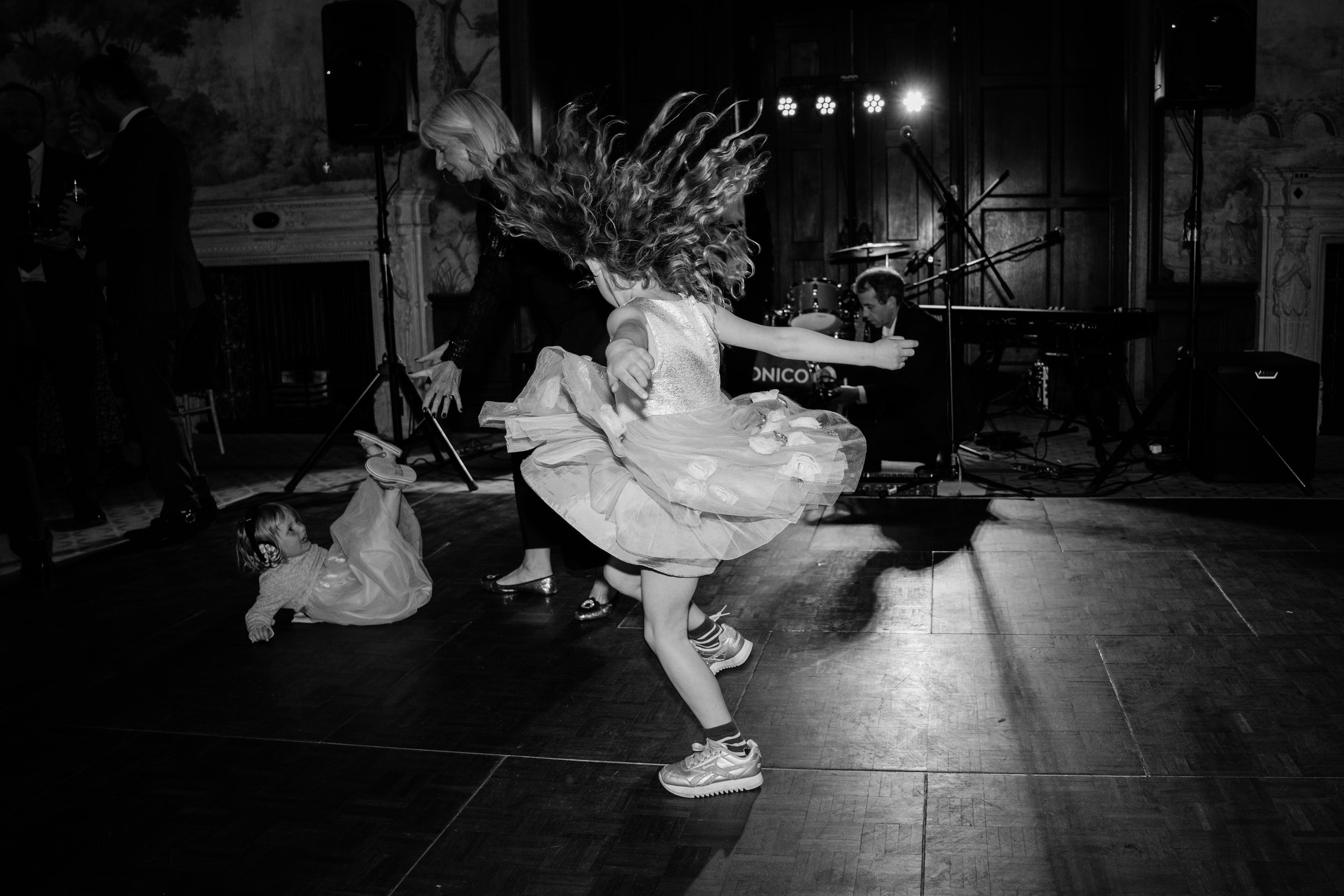 little girl dancing with hair in the air