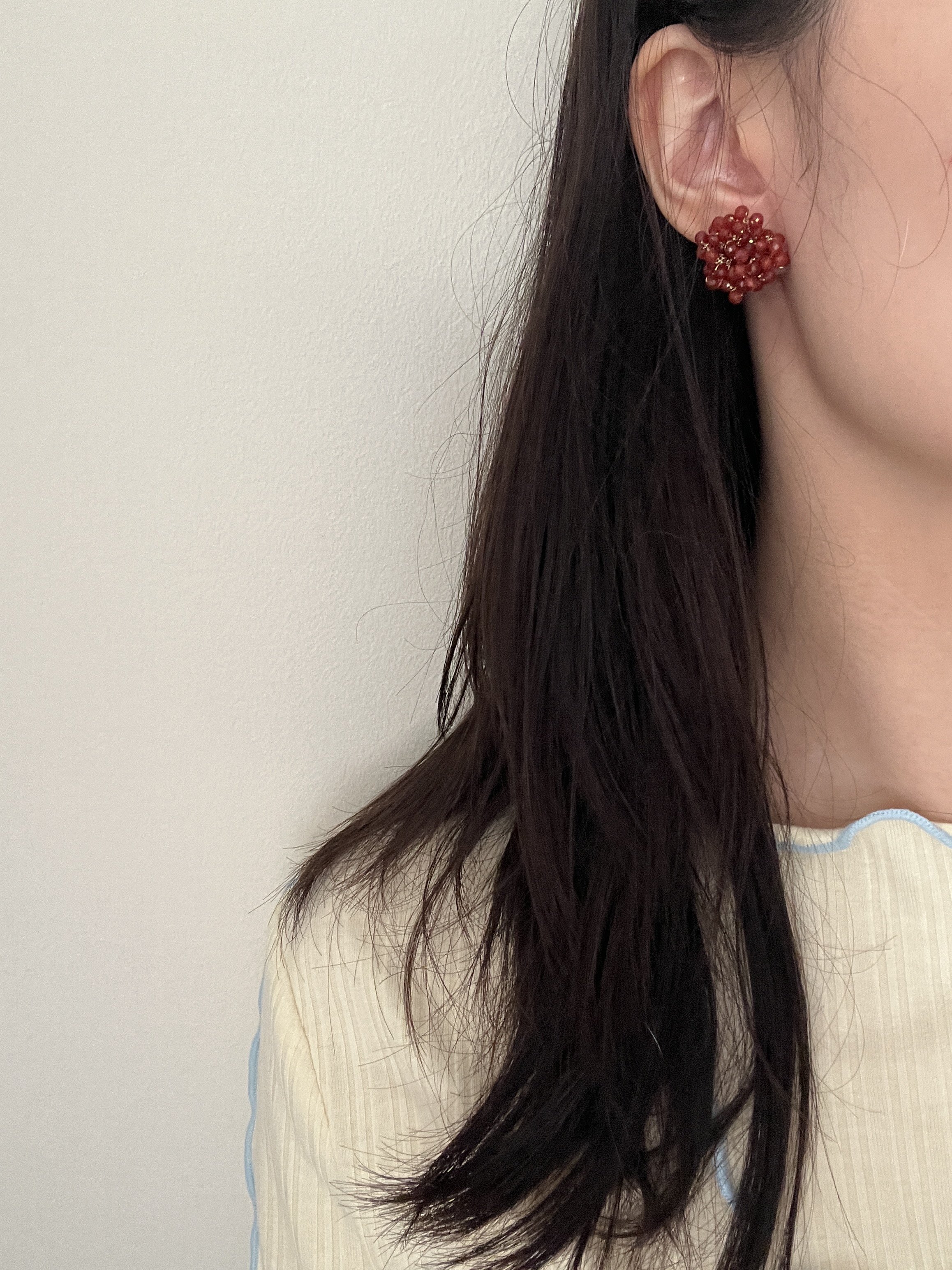bouquet red earring wearing.JPG