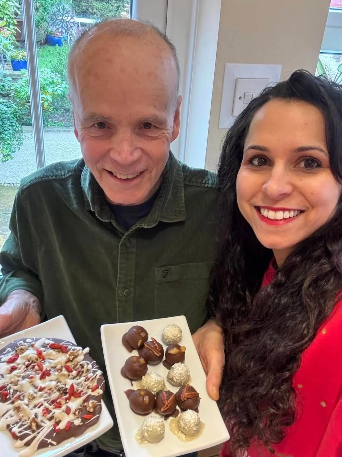 Vanessa Sturman with her Dad holding homemade Christmas chocolates