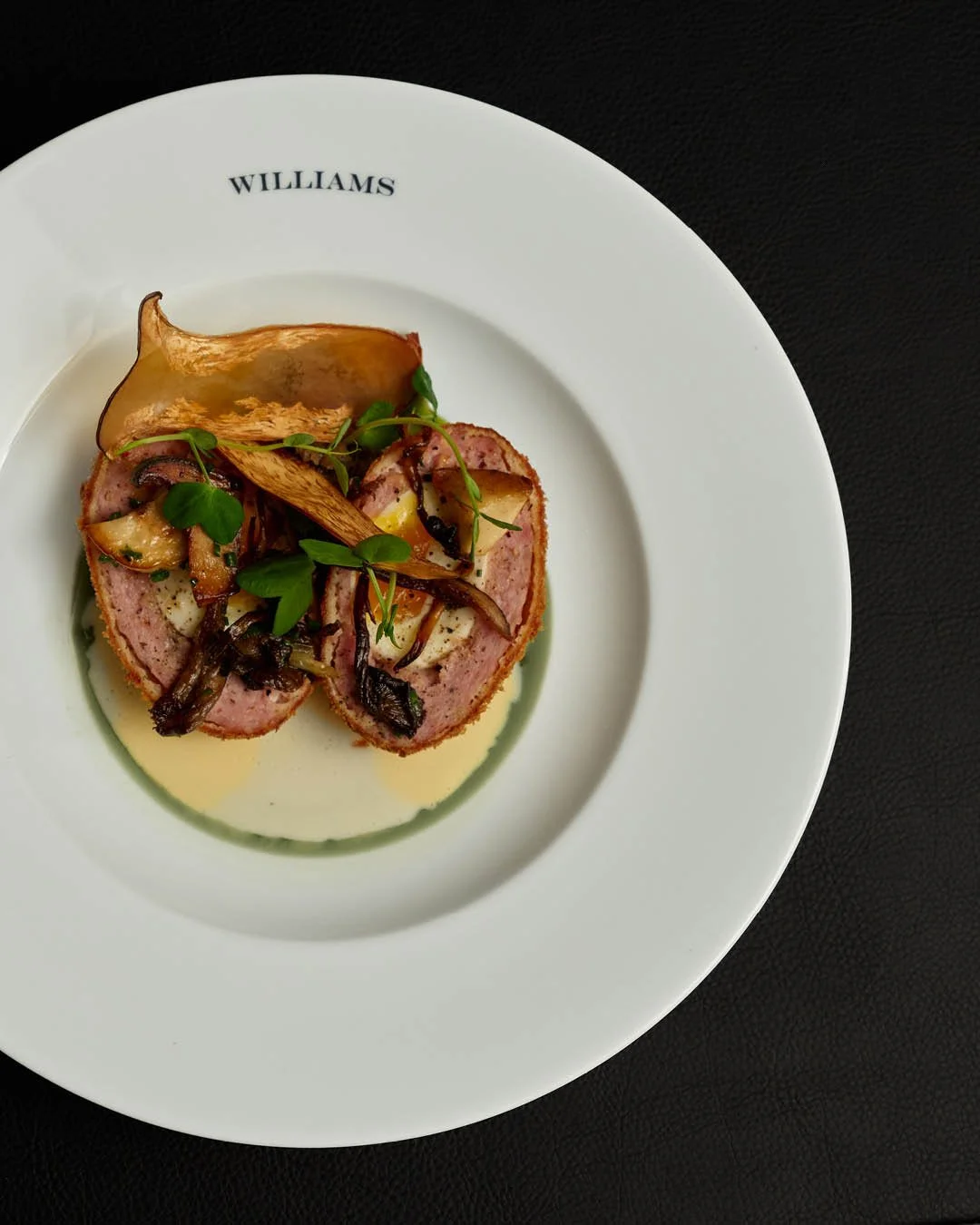 Scotch Egg, the farmhouse way. Deep-fried egg wrapped in pork sausage with crisp breadcrumbs, beurre blanc, lavas oil and a rich mushroom &amp; truffle duxelles, best enjoyed with a glass from the cellar at a candlelit table at Williams.