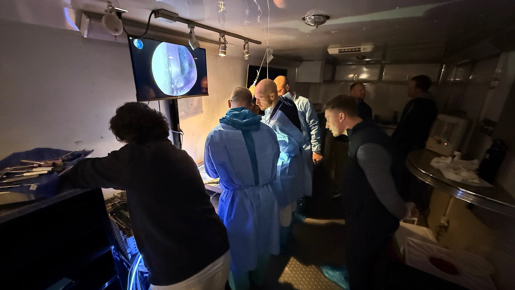 Medical education team preparing and supporting a hands-on lab