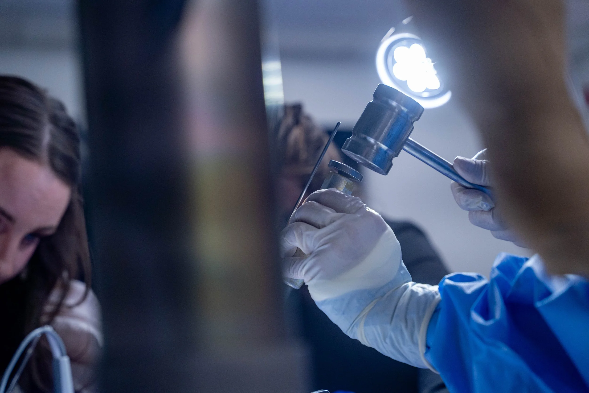 Participant practicing a surgical technique in a hands-on lab