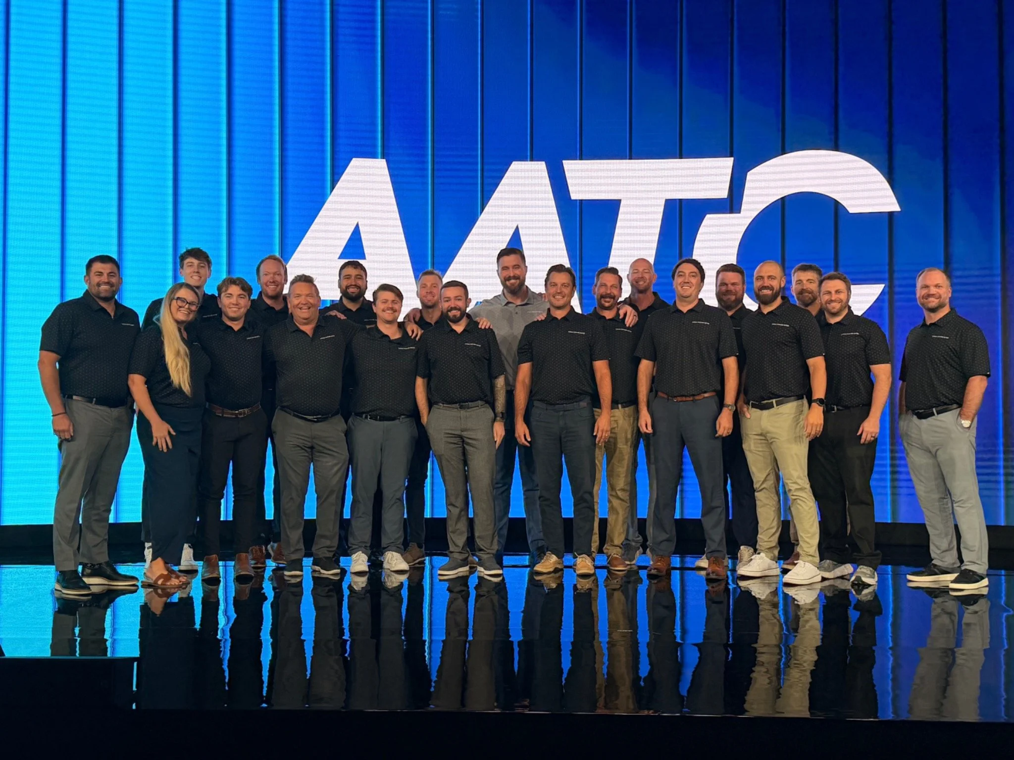 Arthrex team members gathered for a group photo at an AATC event