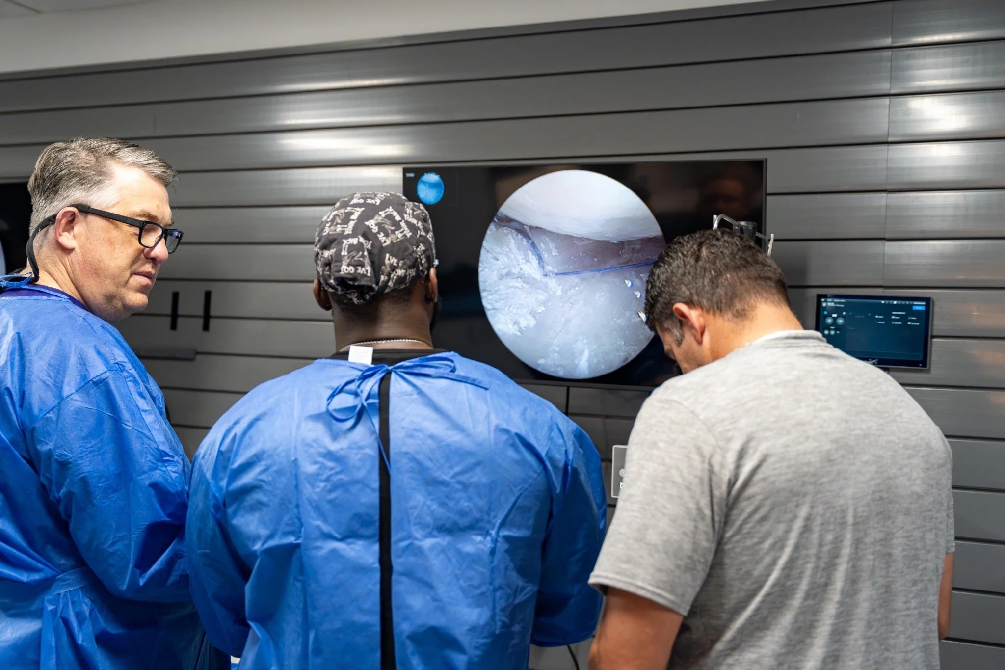 Participants learning together during a hands-on scopes lab