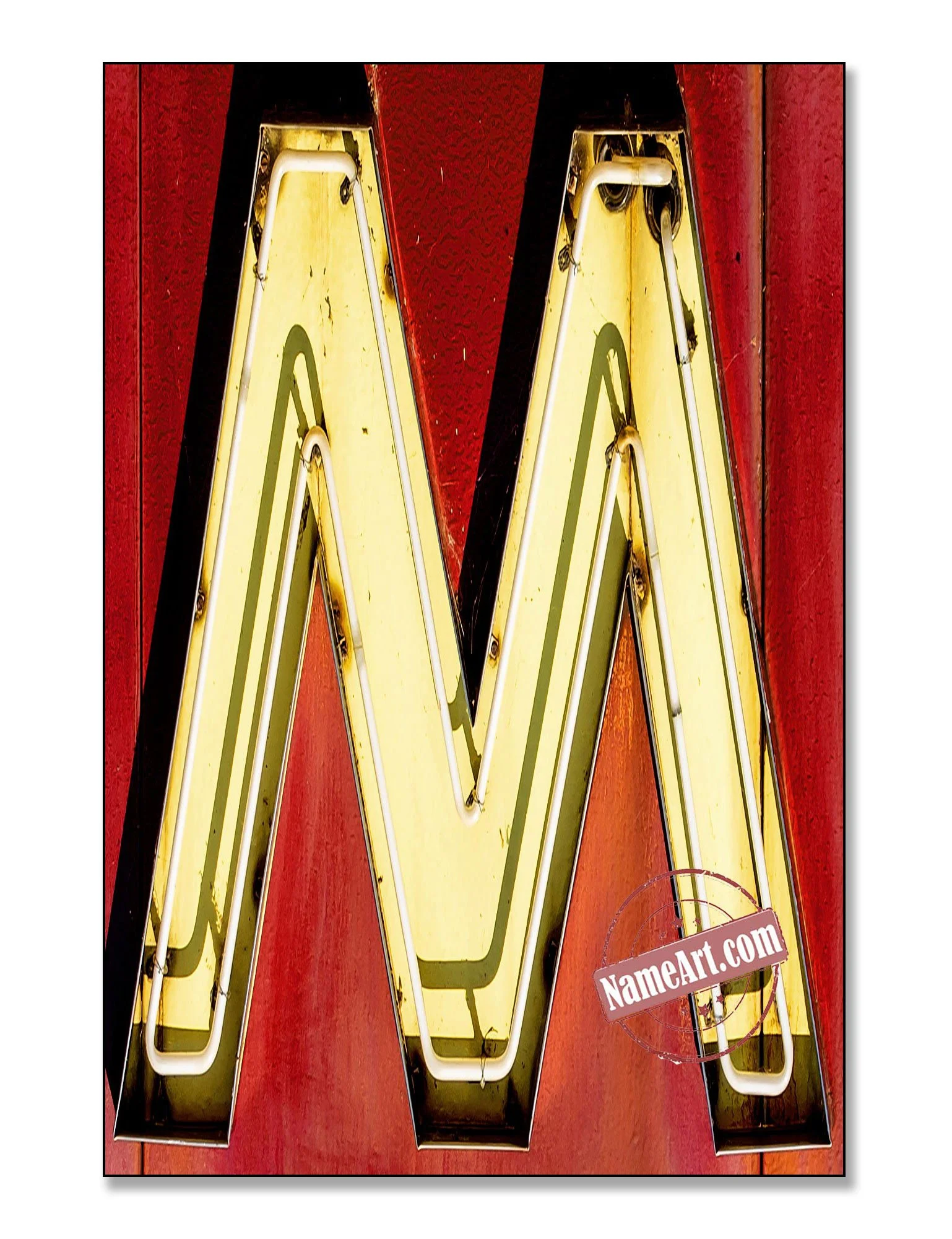 Large yellow neon light in the shape of the letter W mounted on a red wall.