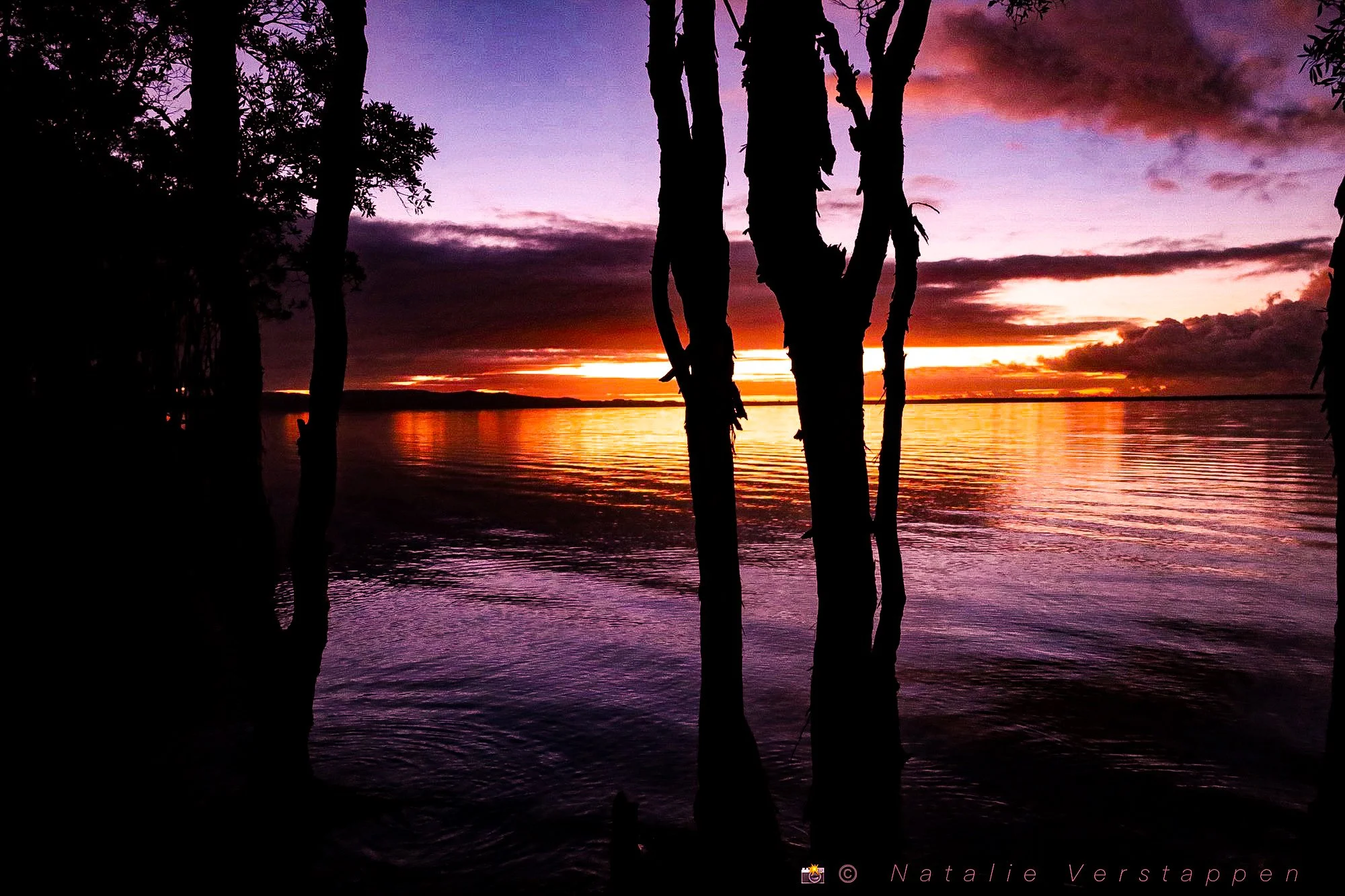 First light coloring the sky in dramatic colors