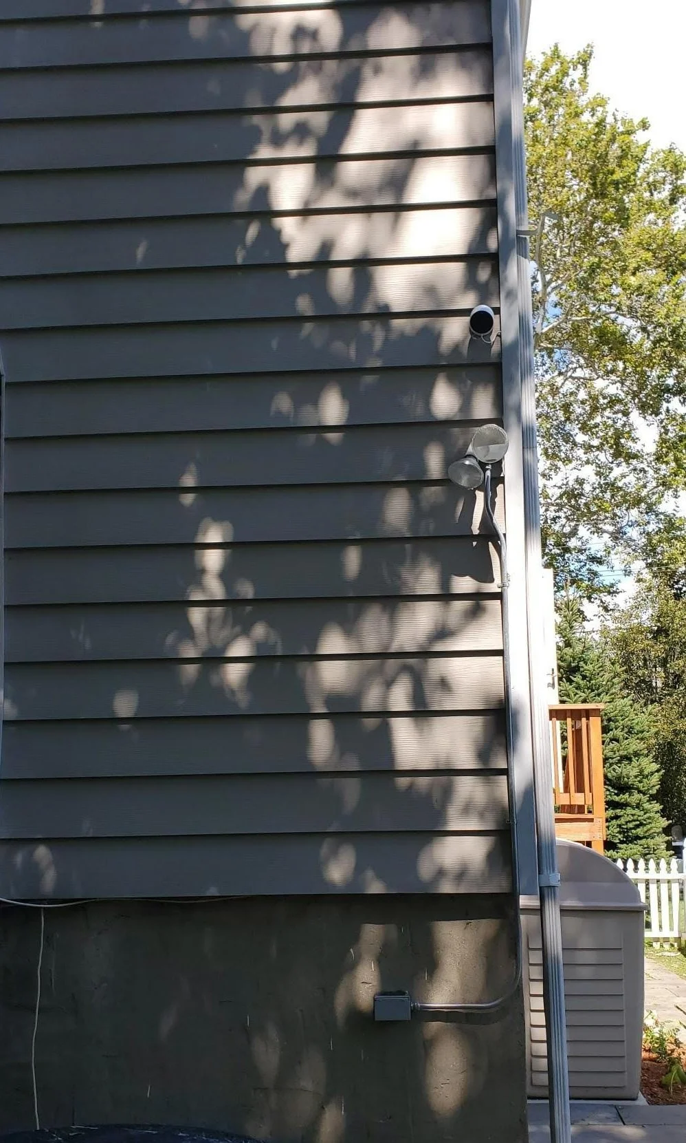 camera on grey side of house.jpg