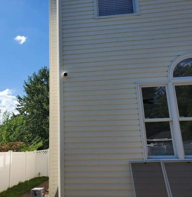 camera on front side of house white.jpg