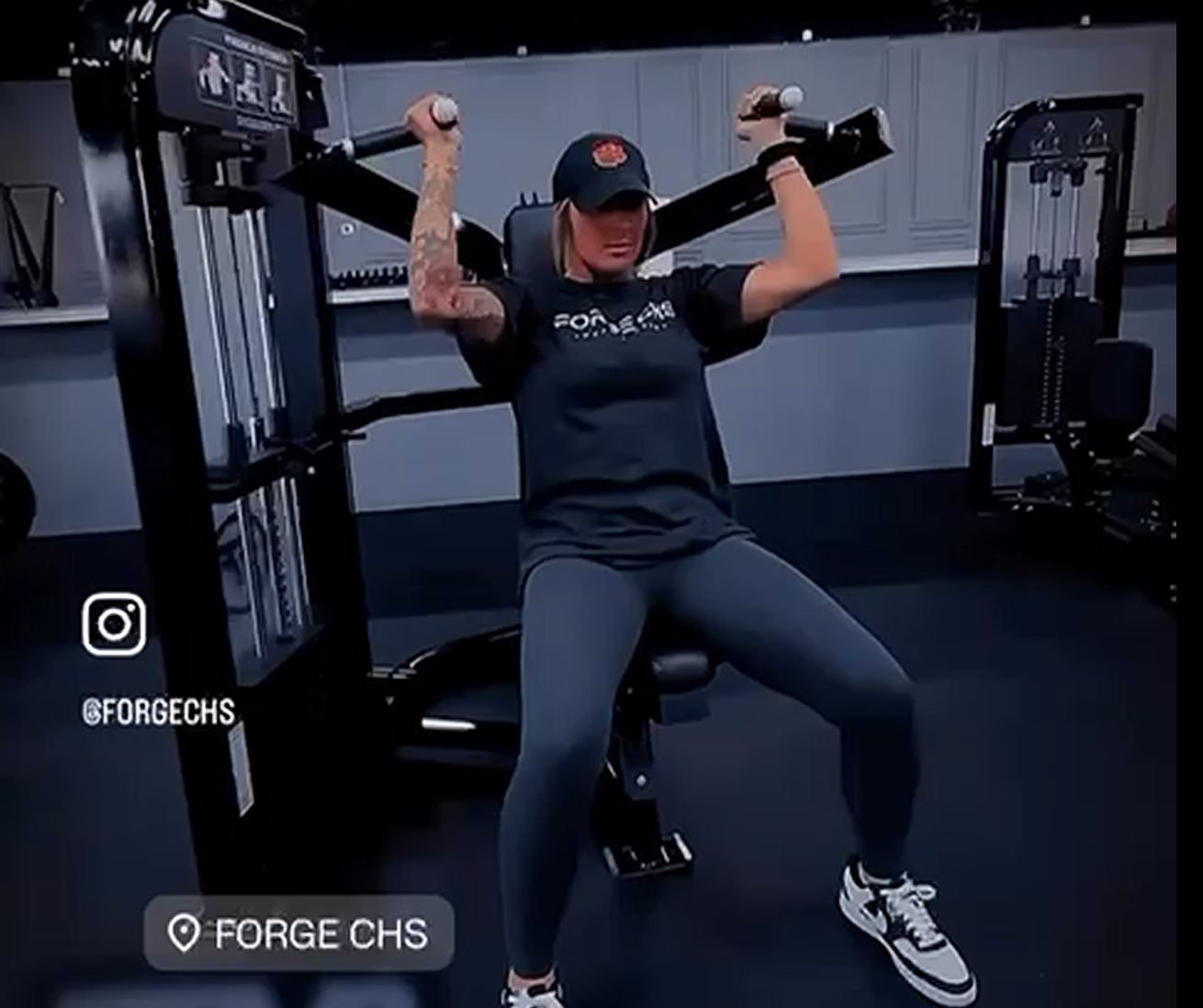 Woman strength training with barbell at Forge CHS gym in West Ashley Charleston SC