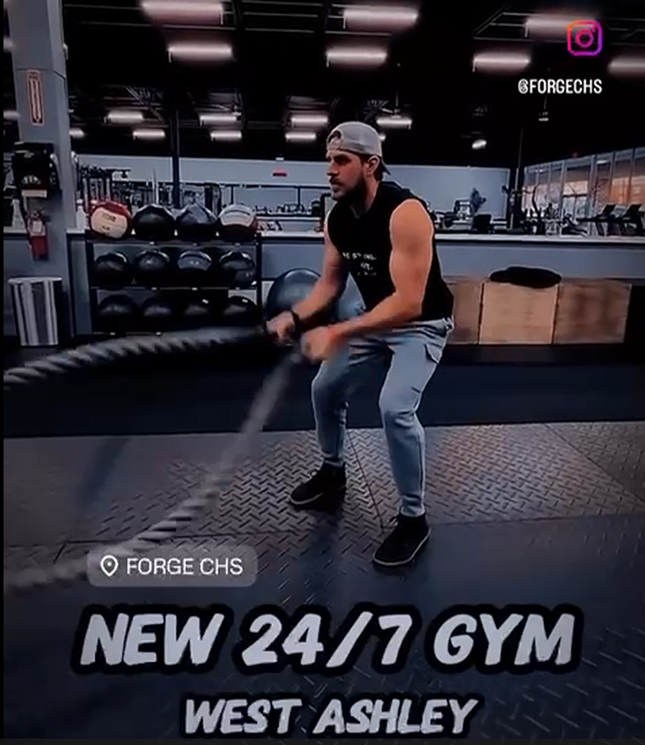 Member doing battle rope training at Forge CHS, the new 24/7 gym in West Ashley Charleston SC