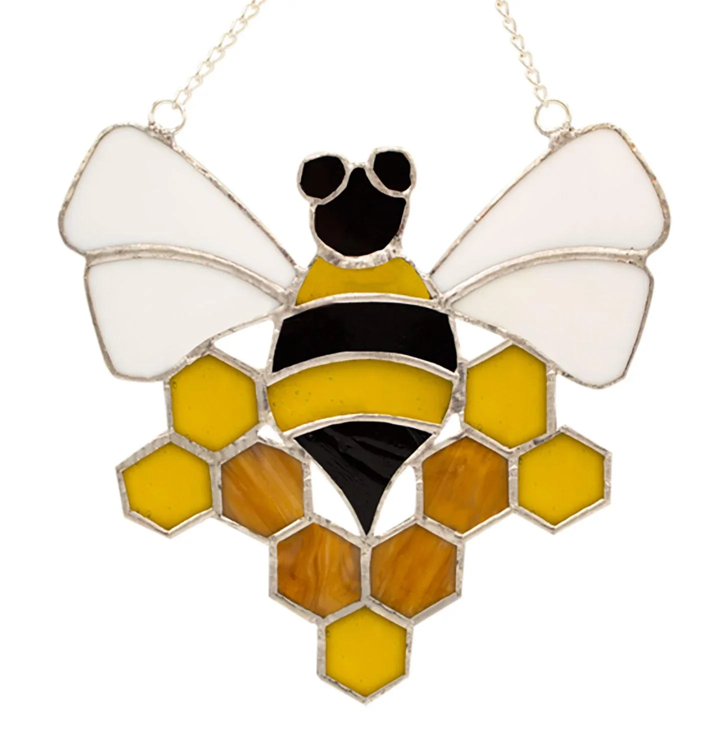 a yellow, black, and white bumblebee glass suncatcher