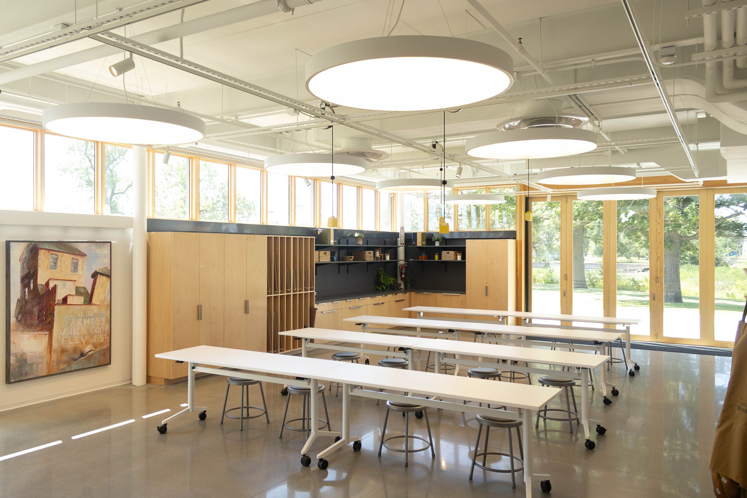 the RiverPlace classroom with tables and lots of natural light