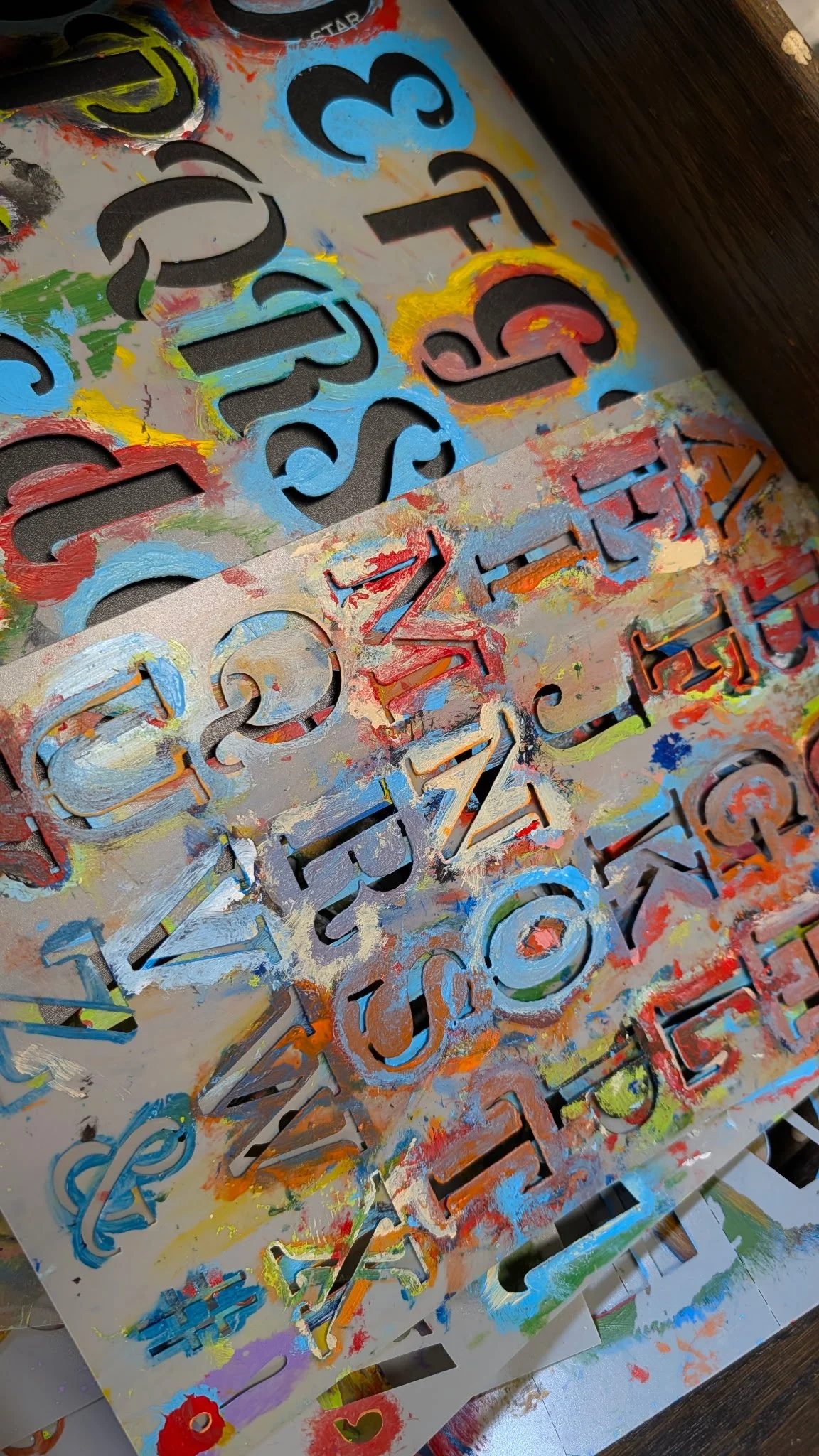 colorful stencils from artist Eric Twait's studio