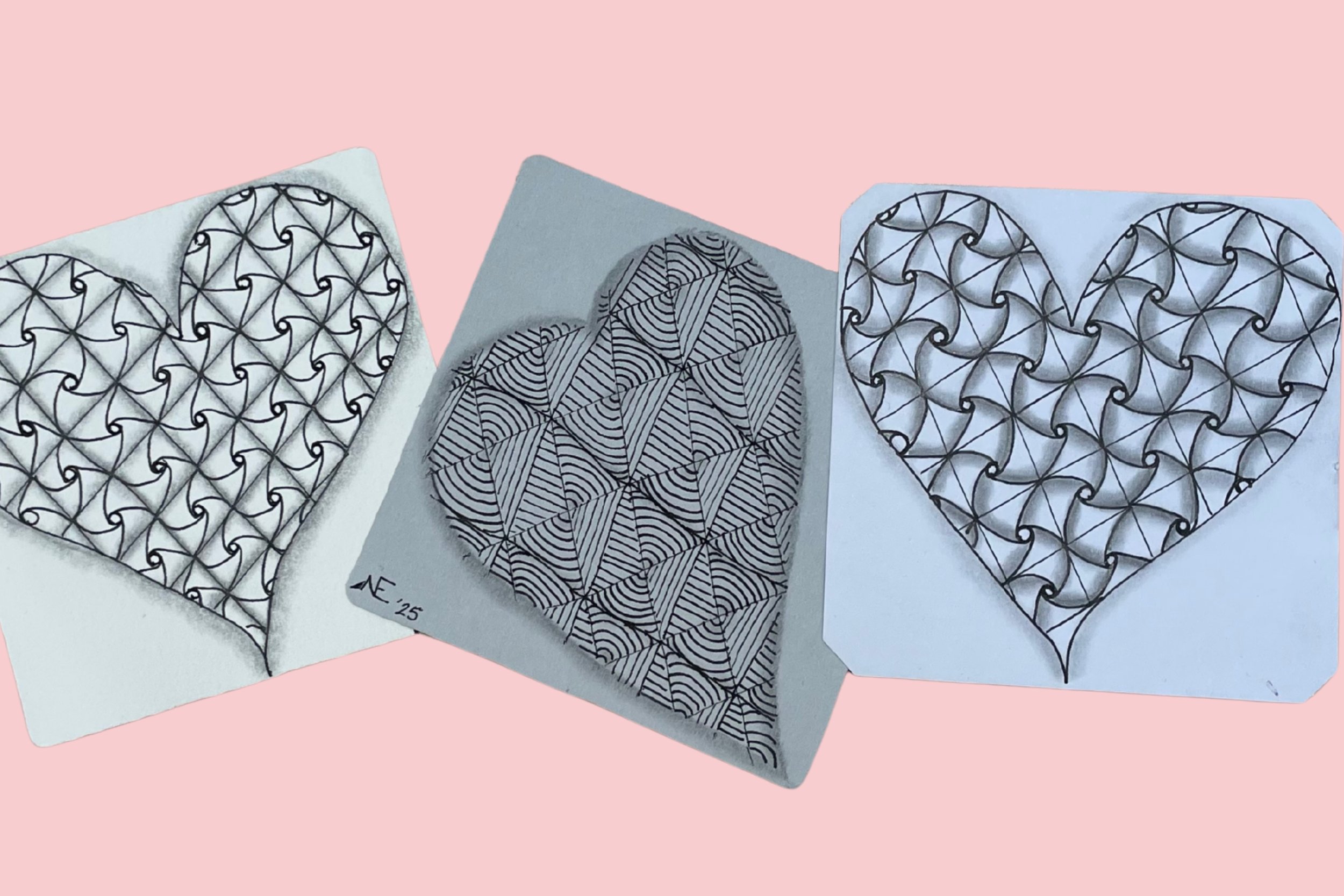 three Zentangle design hearts in black and graphite pen on top of pink background