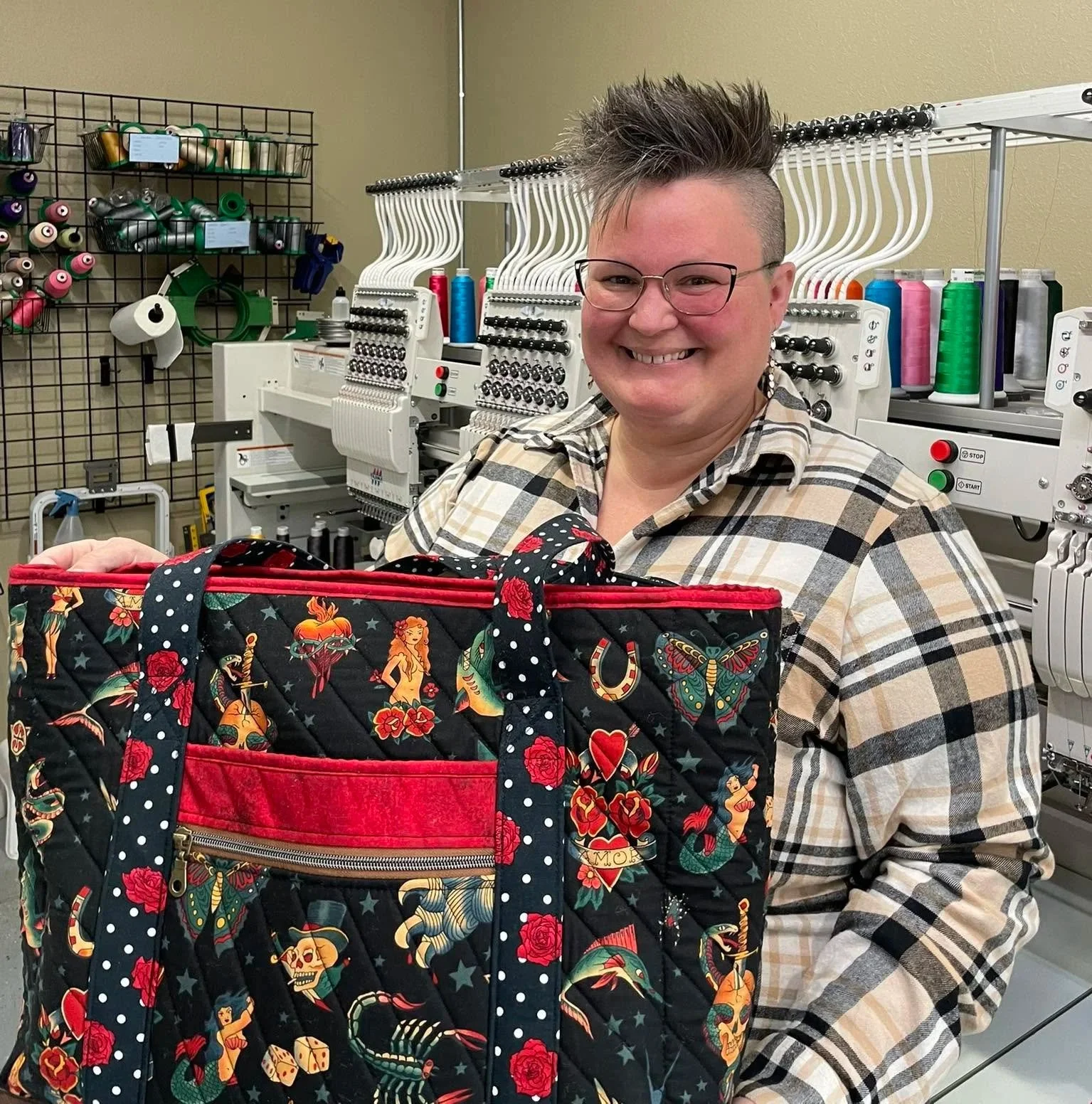 a photo of teacher Carolyn Fortier standing next to a market bag