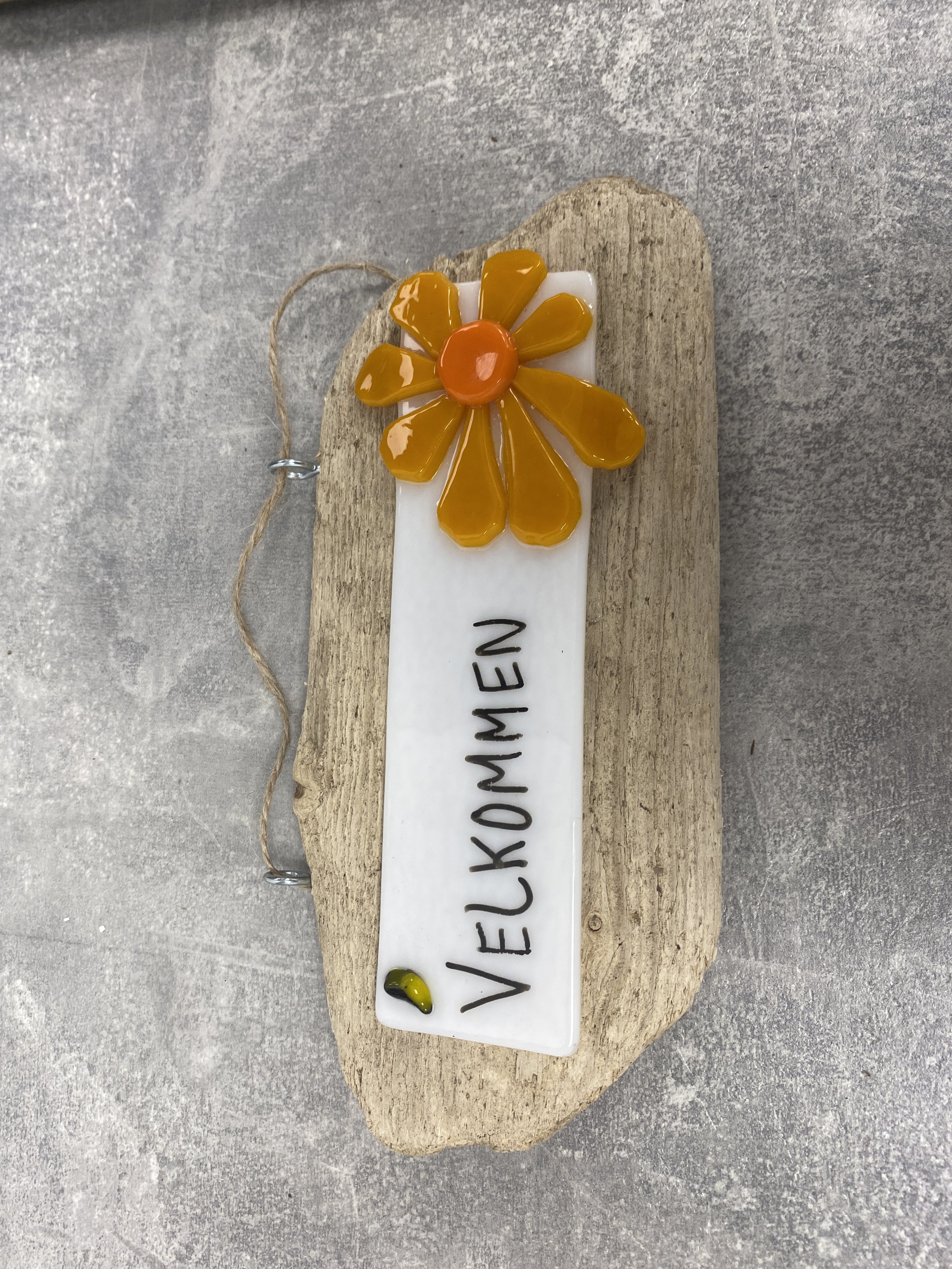 “Velkommenskilt orangeblomst”