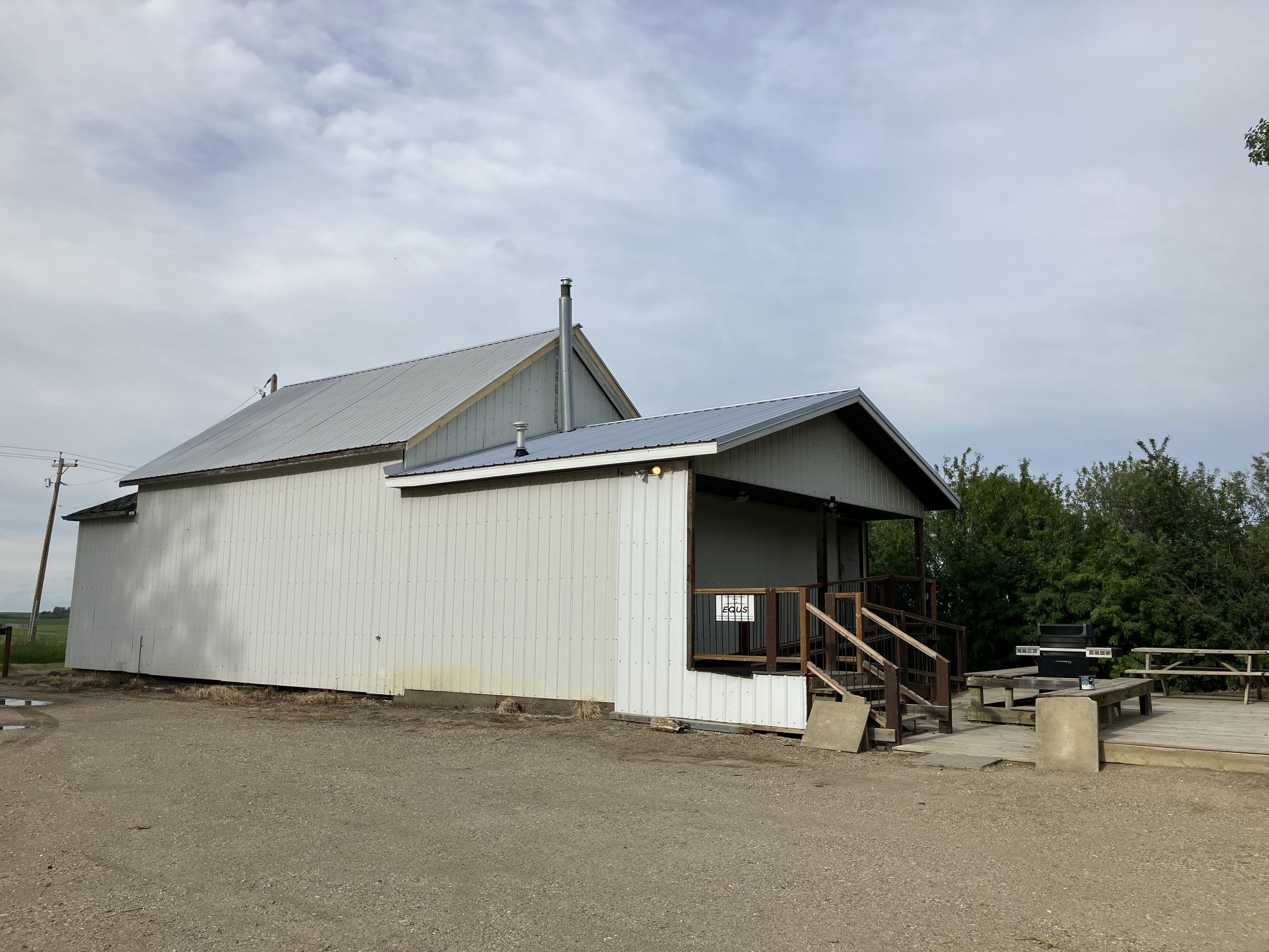 West side of hall - entrance with ramp and deck