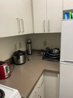 Kitchen After Organizing & Cleaning
A cleared and refreshed kitchen after clutter was addressed and counters and surrounding surfaces were thoroughly cleaned.